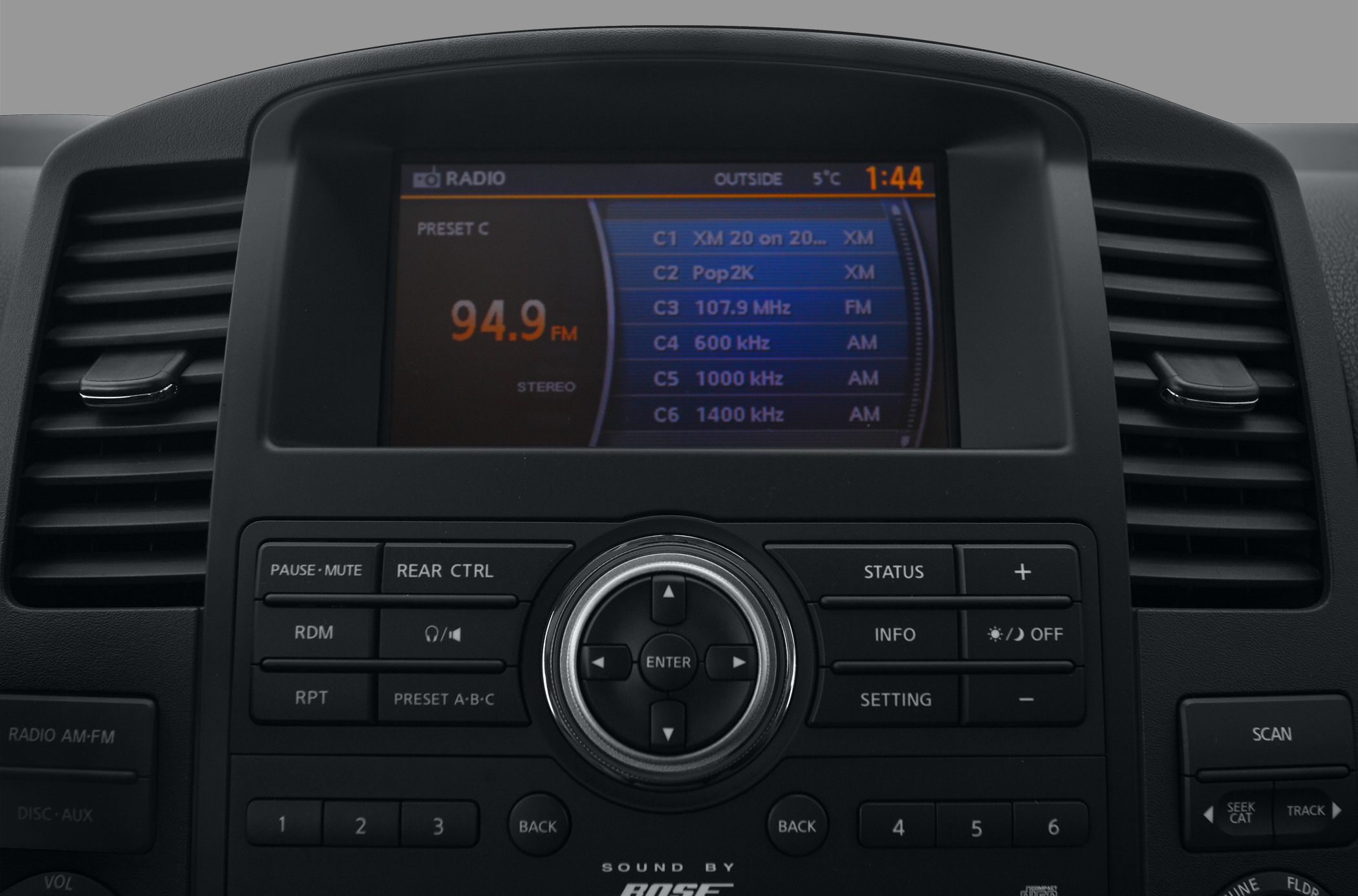 Radio and infotainment control panel with digital display and presets