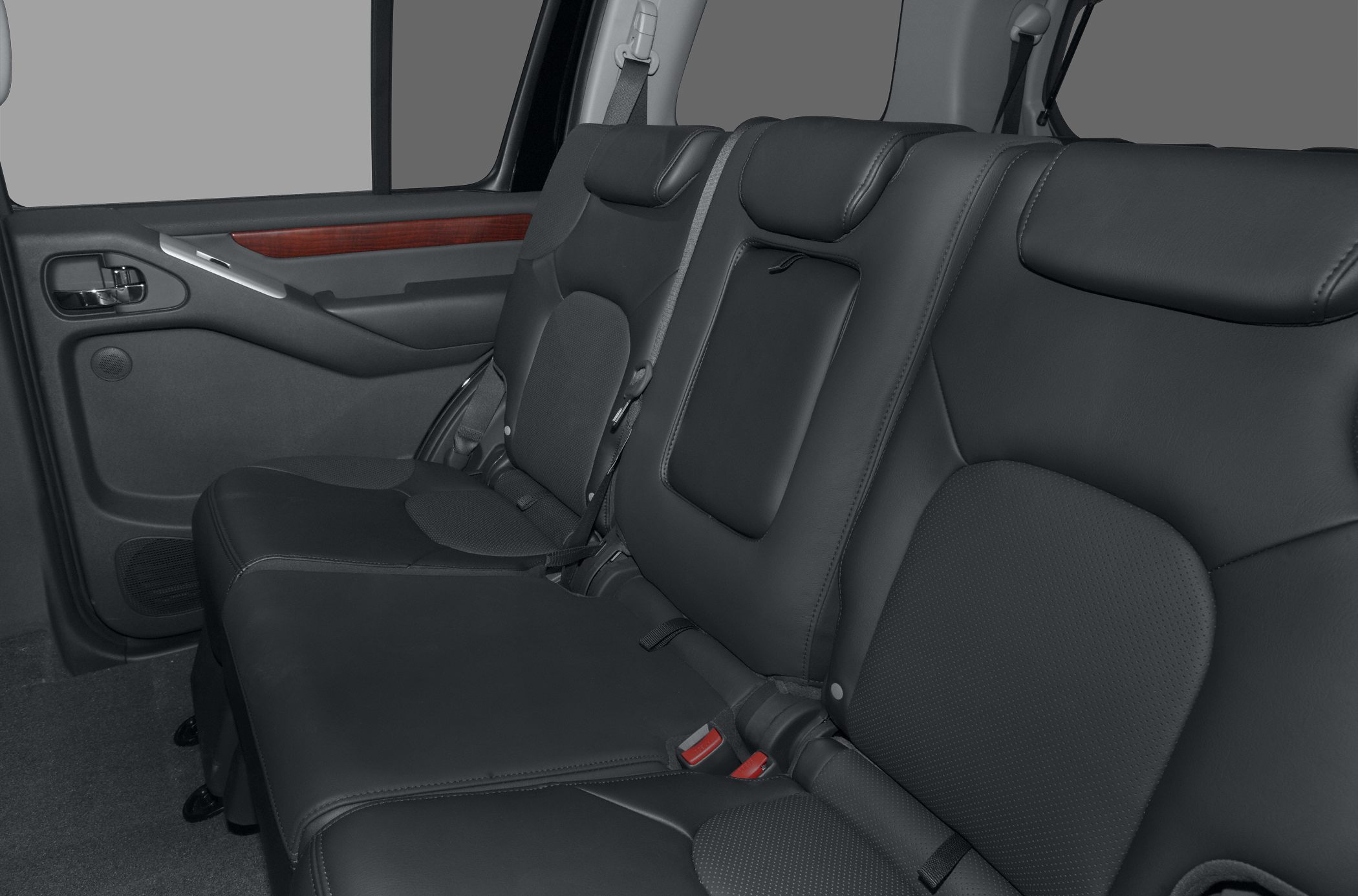 Black leather rear seats with detailed door panel and seat belts
