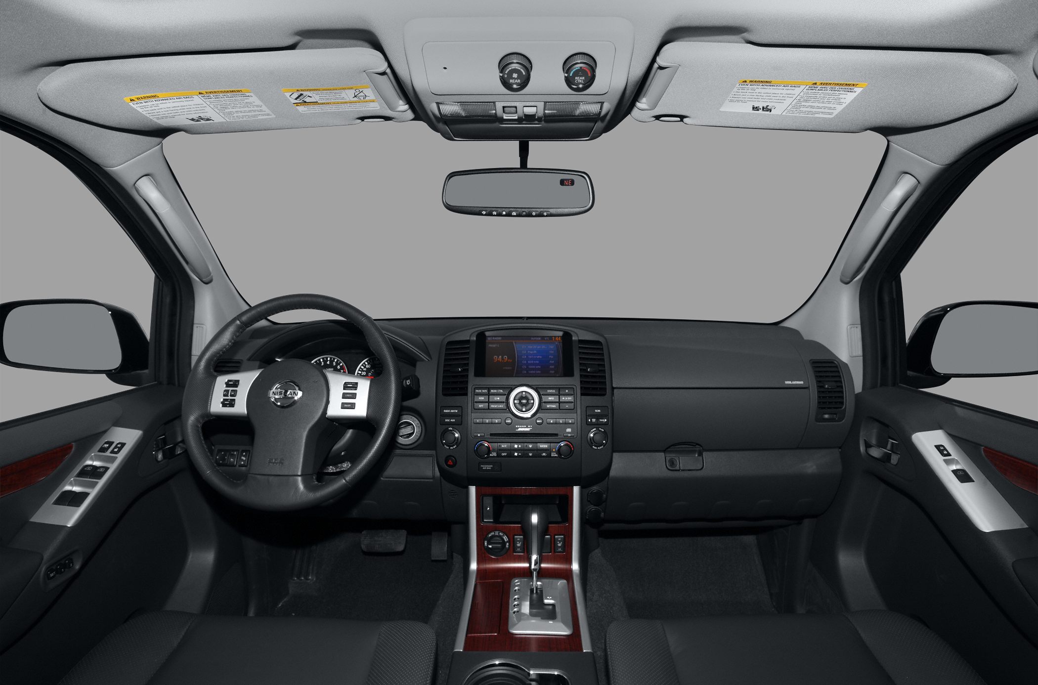 Dashboard, steering wheel, center console with wood trim