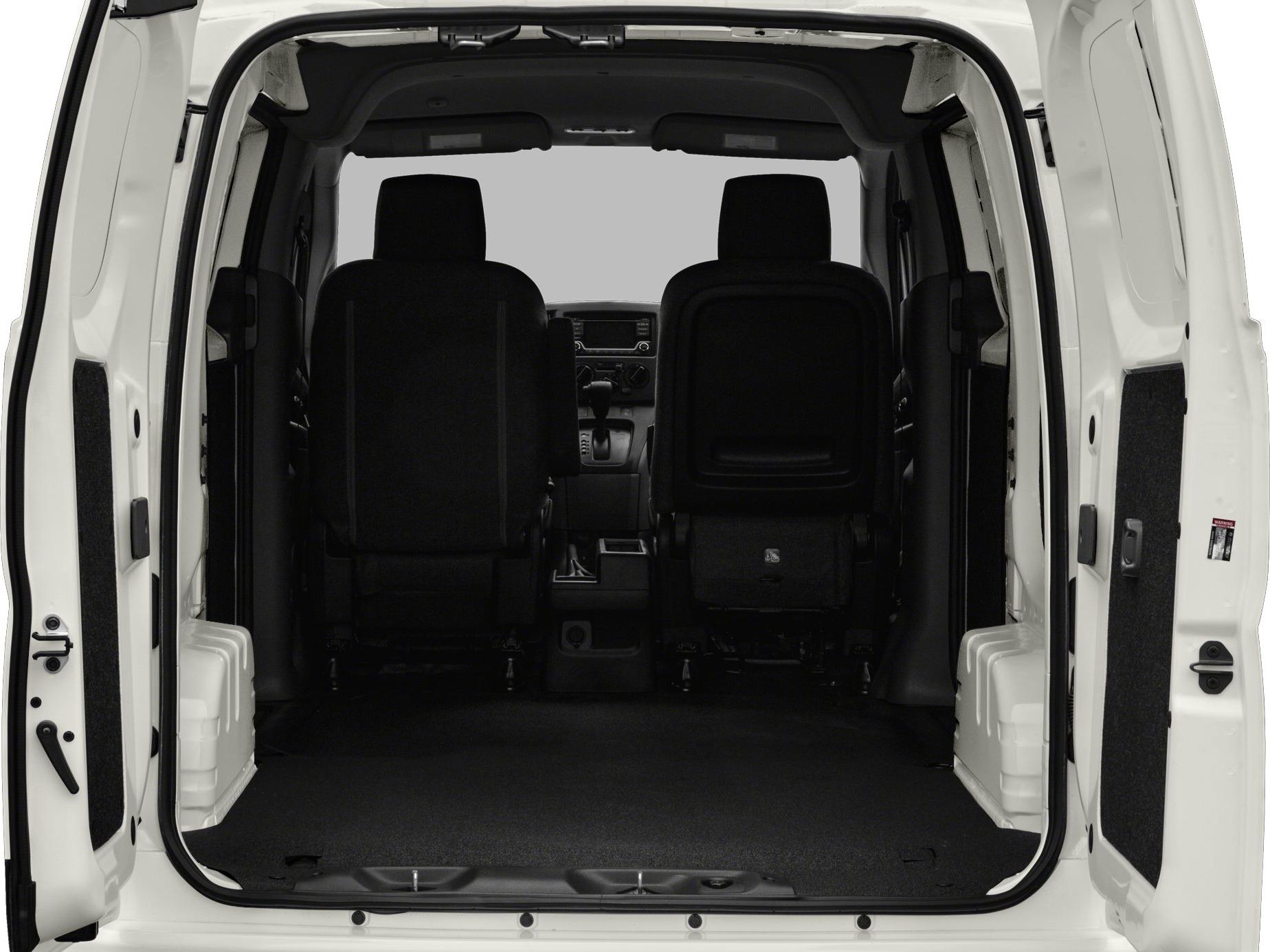 Spacious empty cargo area with rear seats of a van interior