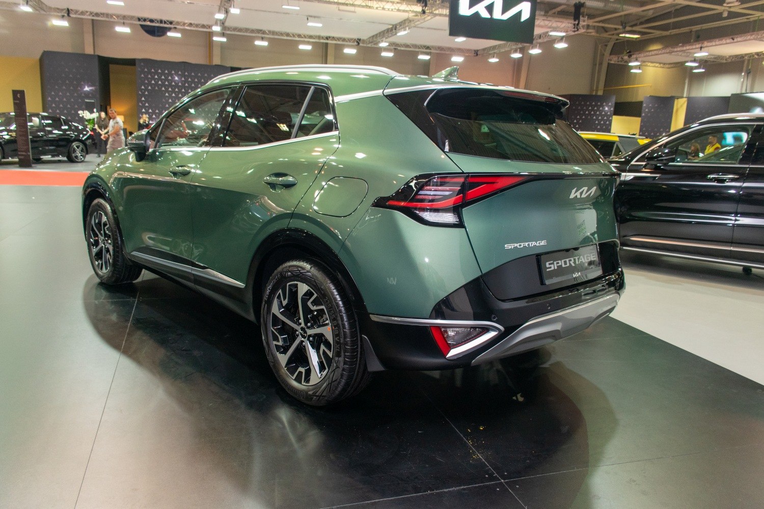 Rear and side profile with alloy wheels and distinctive tail lights