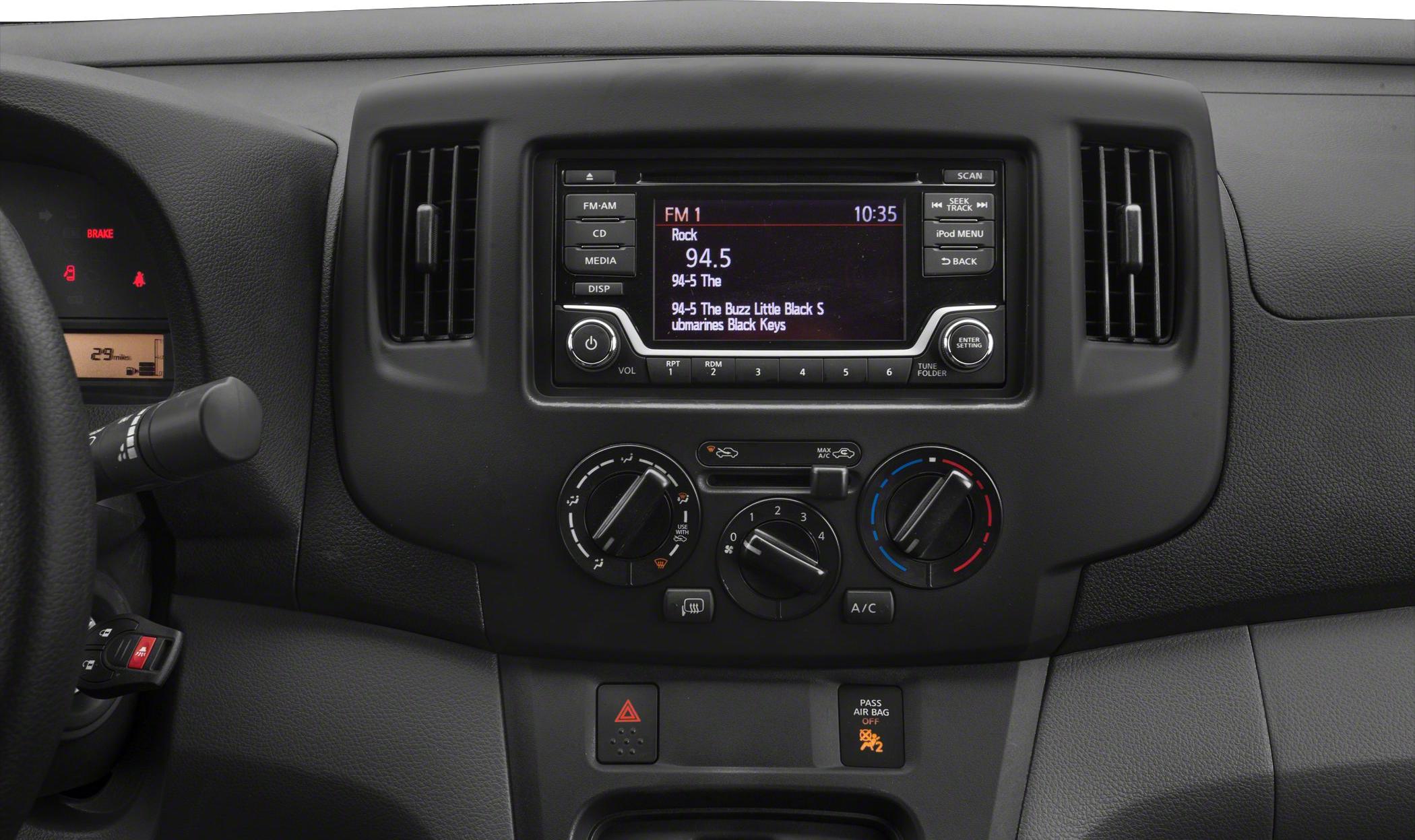 Dashboard radio and climate control panel with knobs and display screen