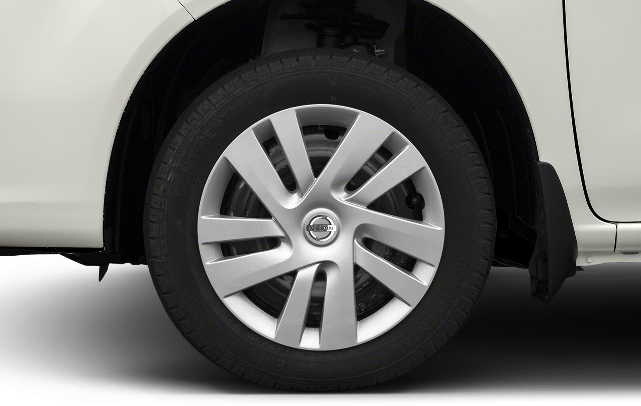 Close-up of Nissan NV200 wheel and alloy rim with tire tread