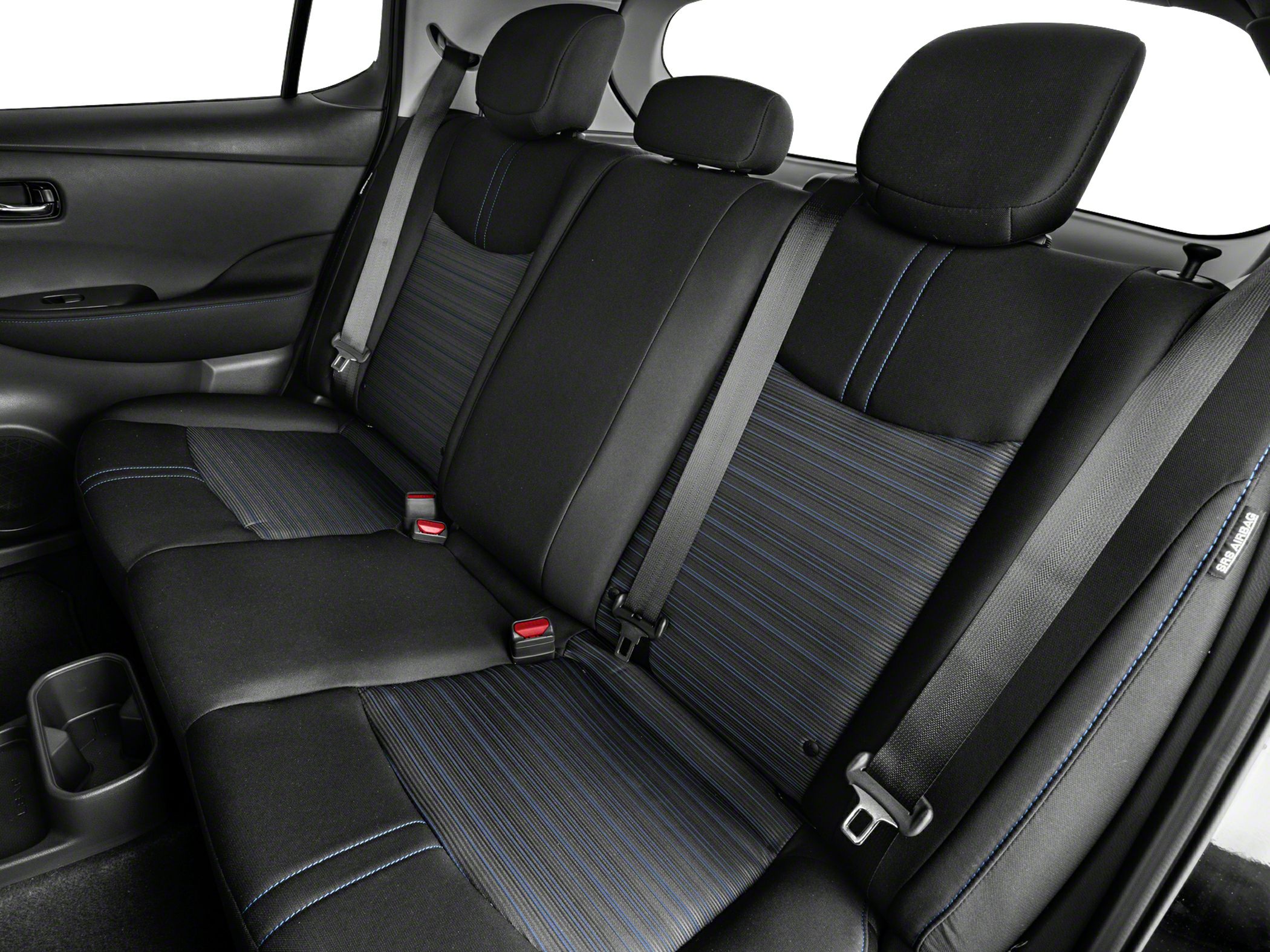 Rear seat with black and striped fabric upholstery, three headrests, and seatbelts.