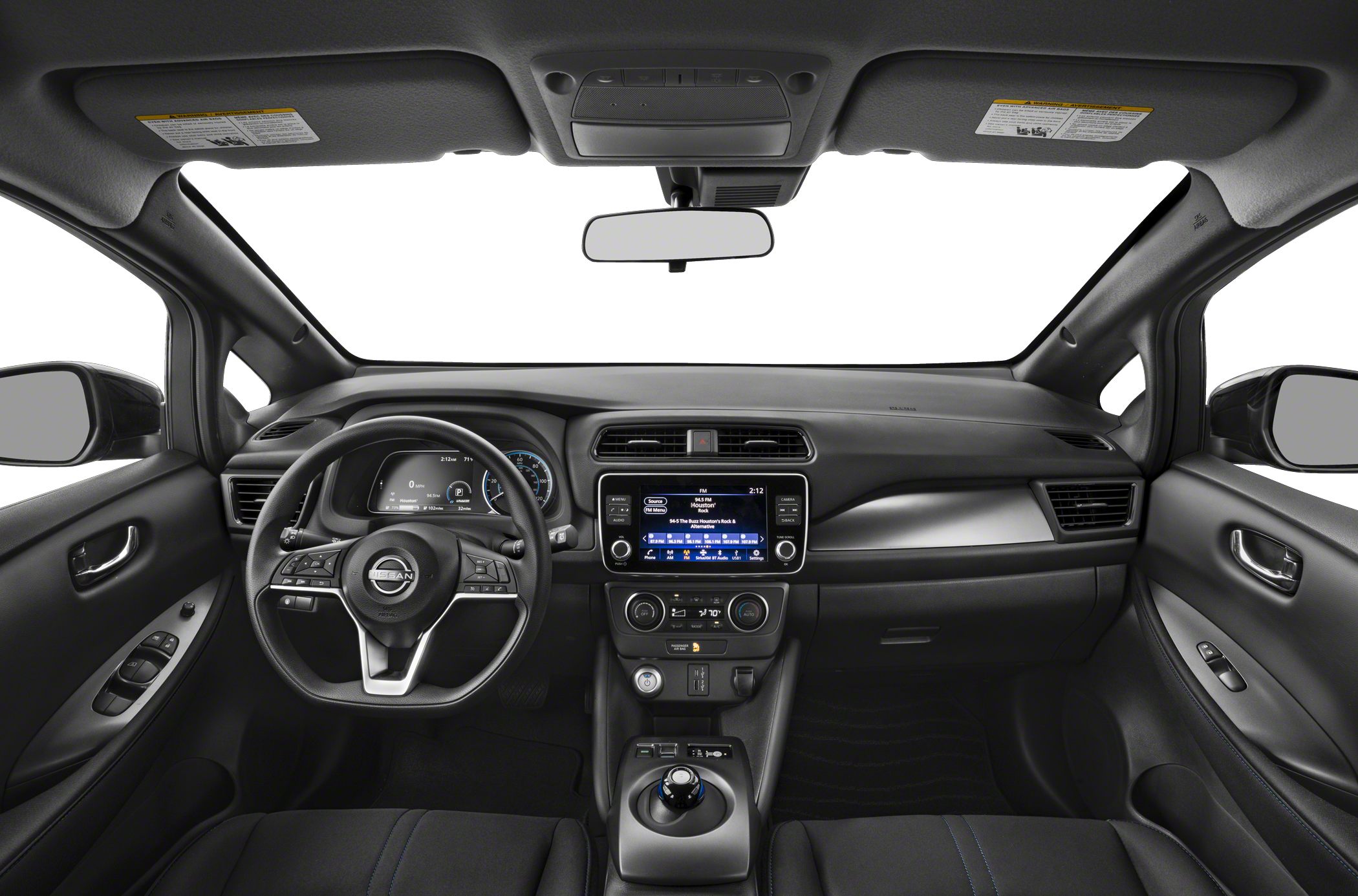 Dashboard, steering wheel, and center console with gear selector
