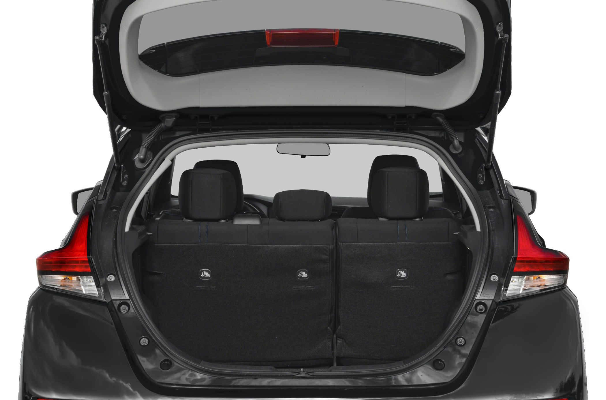 Hatchback rear open tailgate with folded rear seats and cargo space.