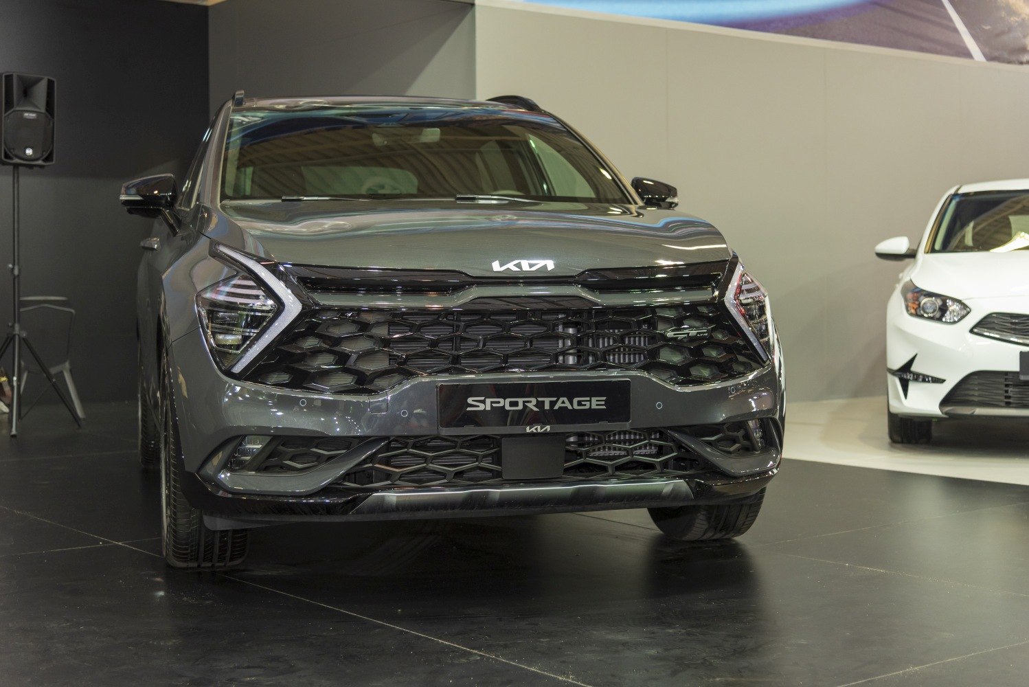 Front view with distinctive honeycomb grille and angular LED headlights