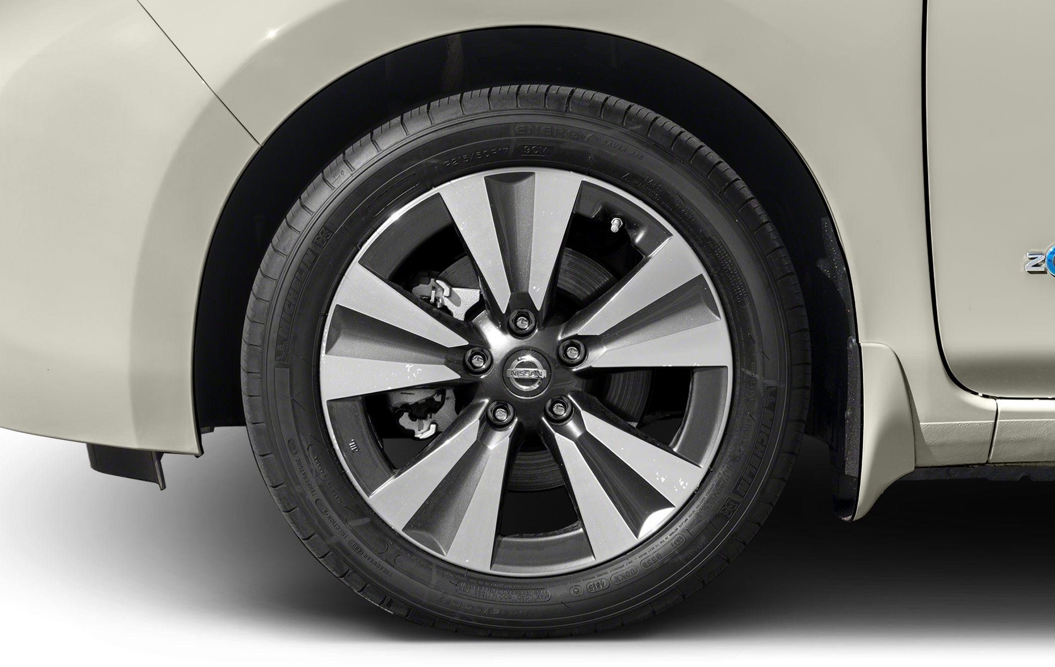 Close-up of alloy wheel and tire sidewall.