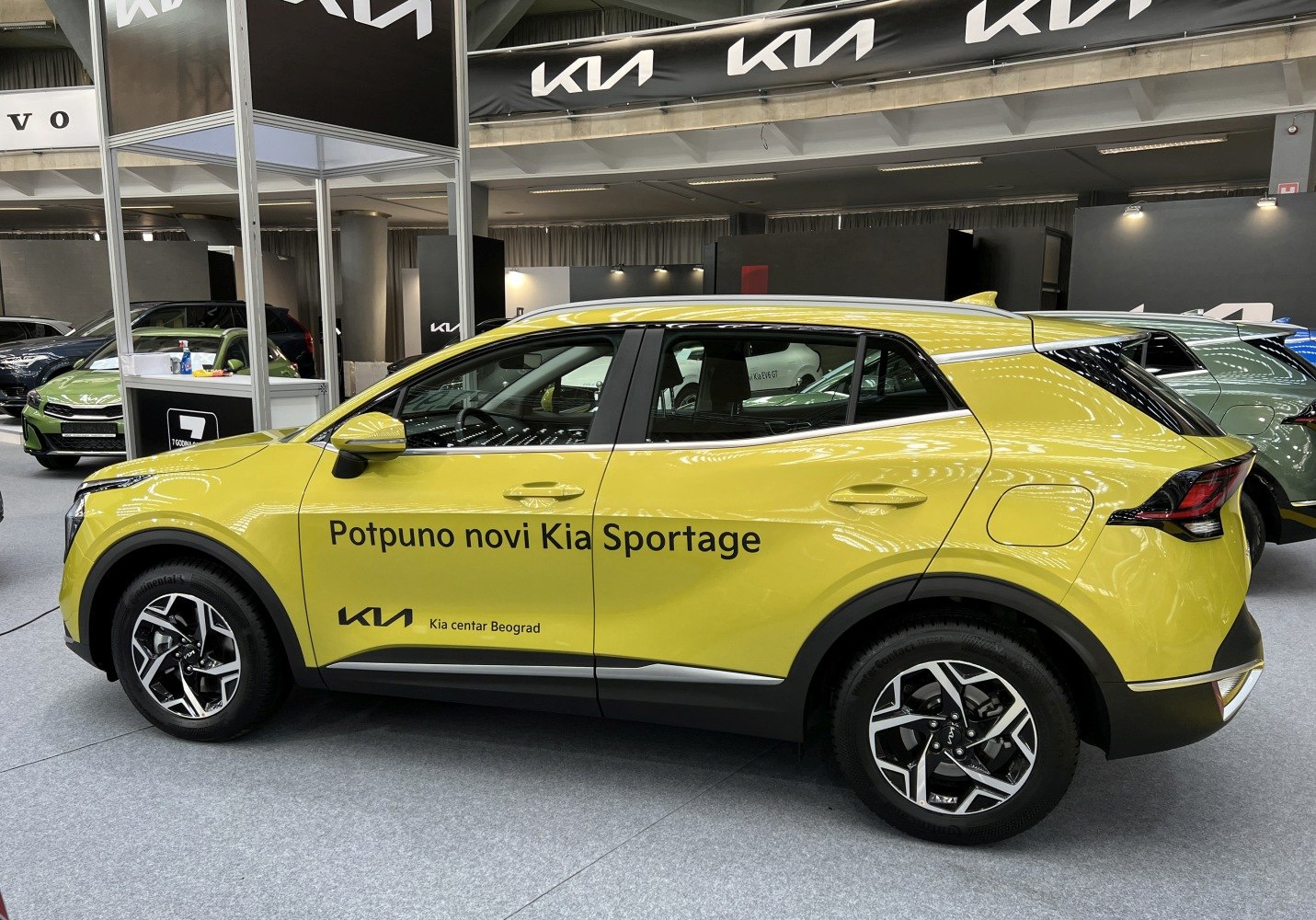 Yellow SUV side profile with alloy wheels