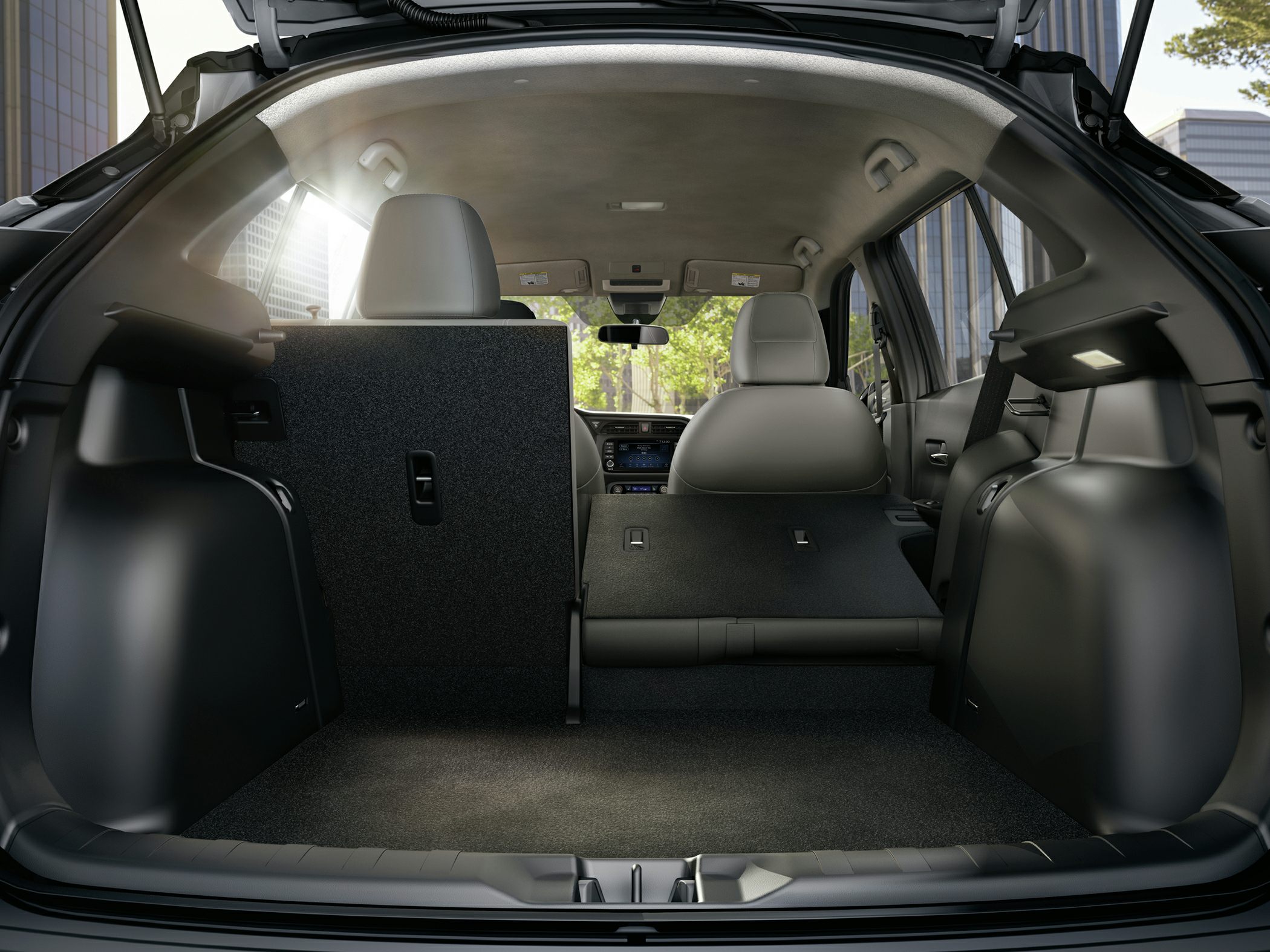 Split-folding rear seats and spacious trunk area with interior lighting.