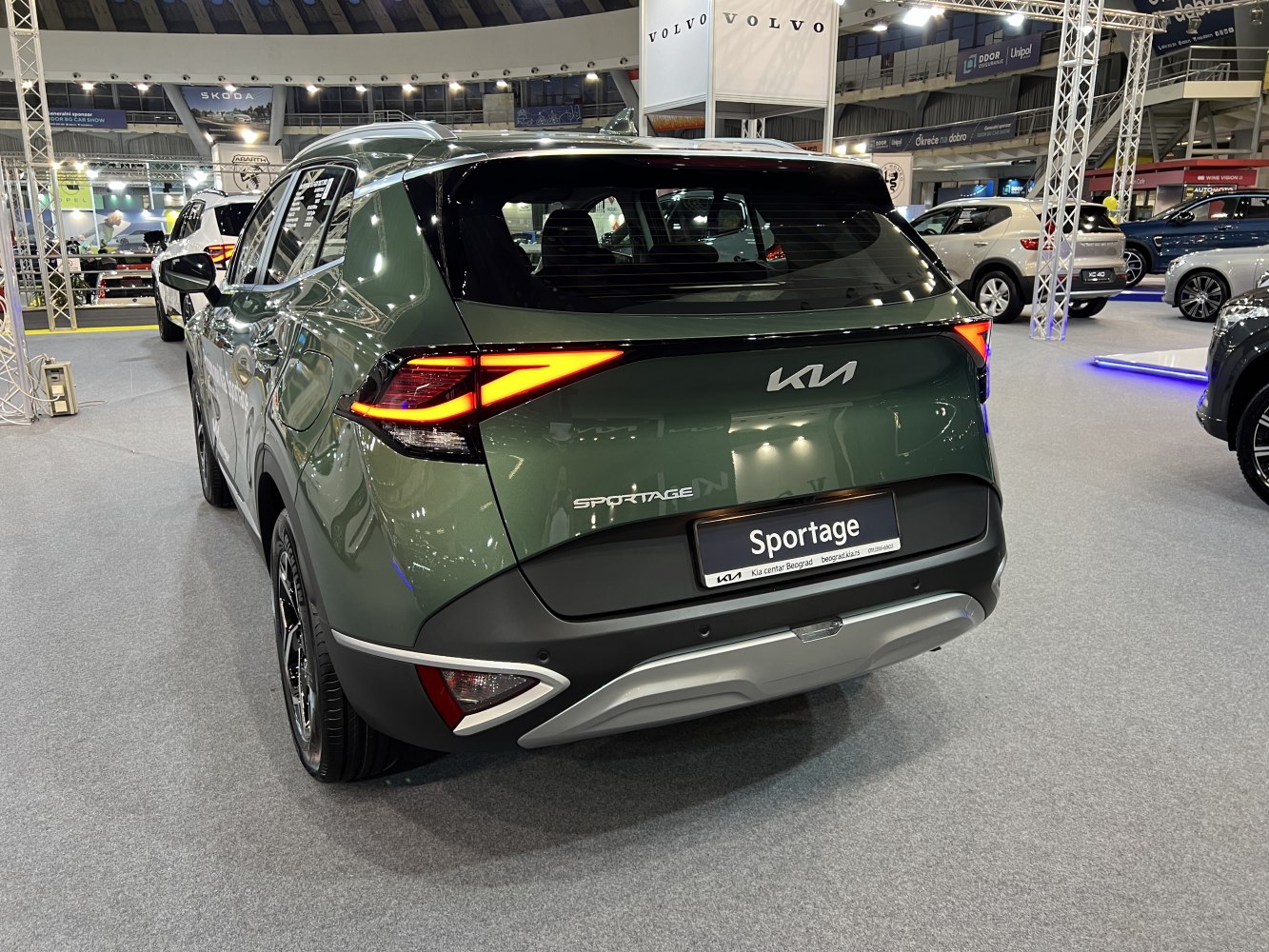 Rear perspective showing unique tail light design and bumper of an SUV.
