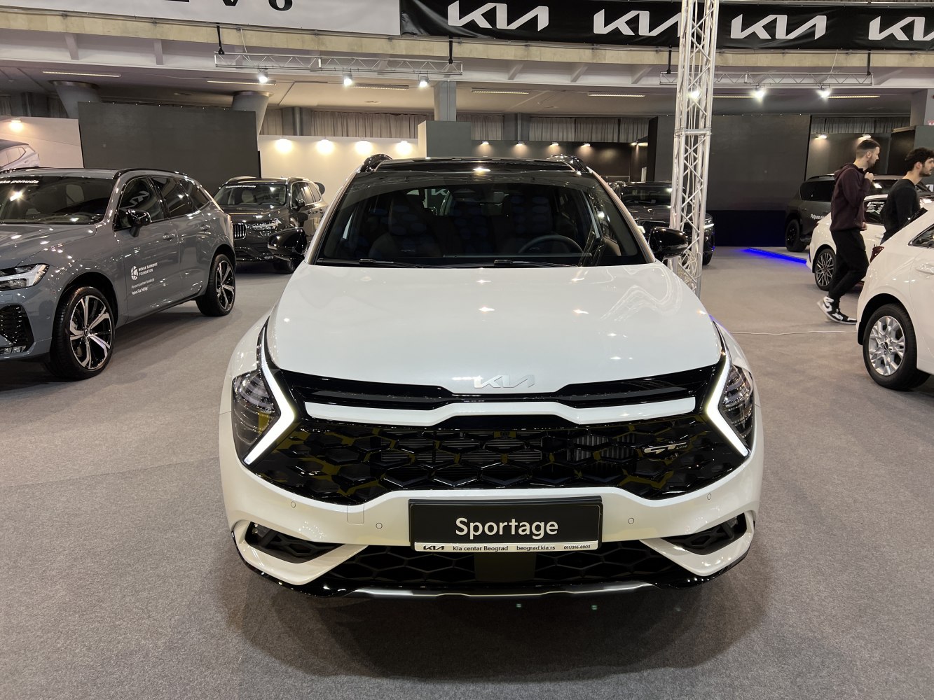 Front view with LED headlights and black grille