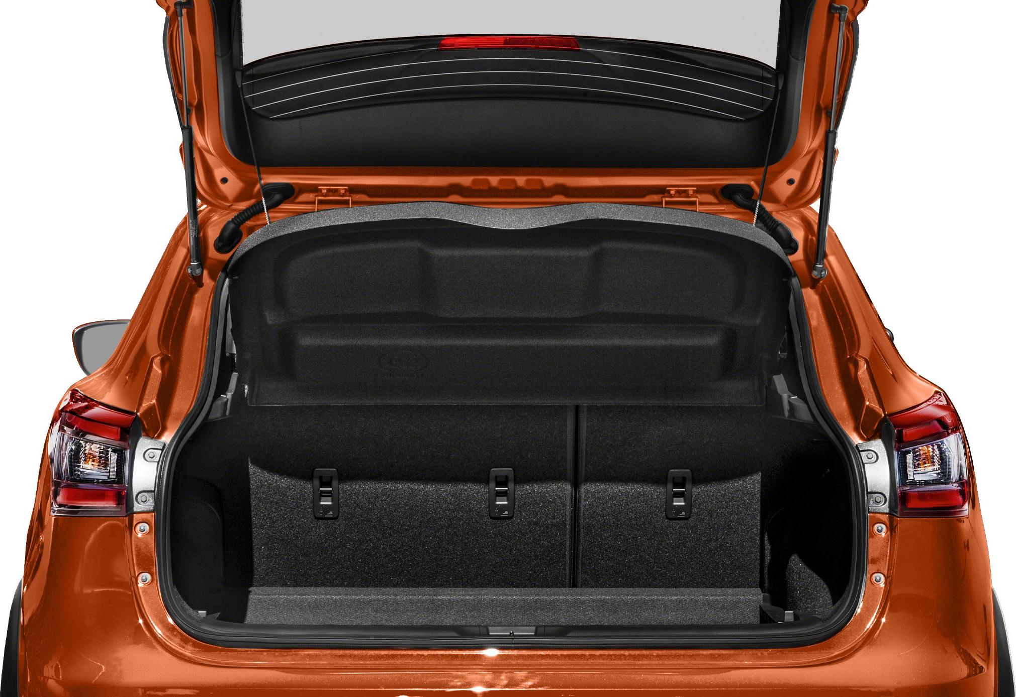 Open rear trunk cargo space with folded seats and cargo cover
