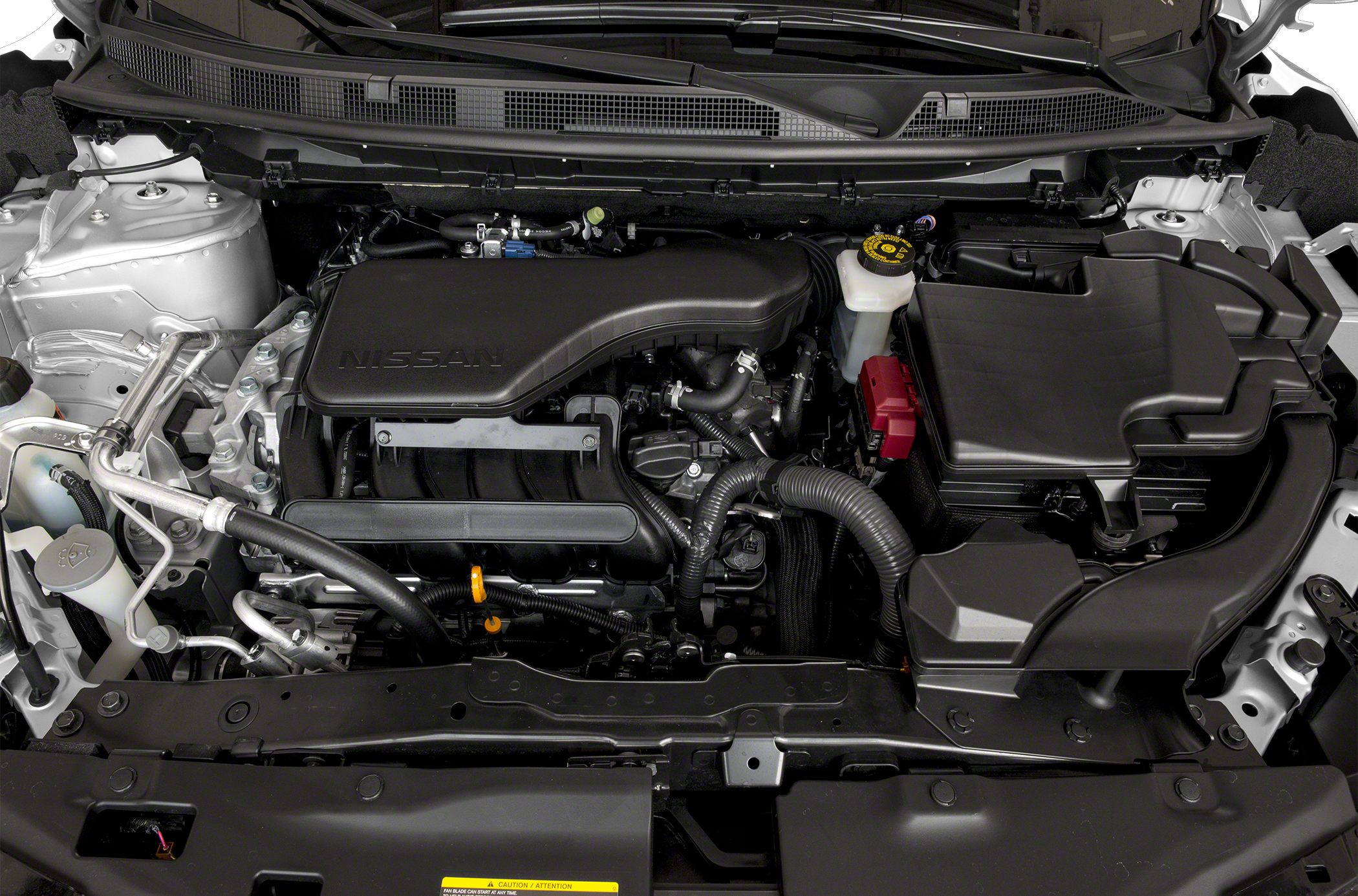 Engine bay with air intake and fluid reservoirs.