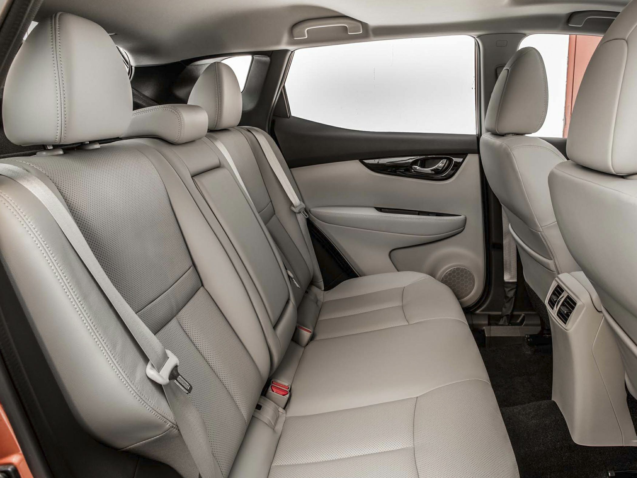 Leather rear seats and door panel in mid-size SUV interior