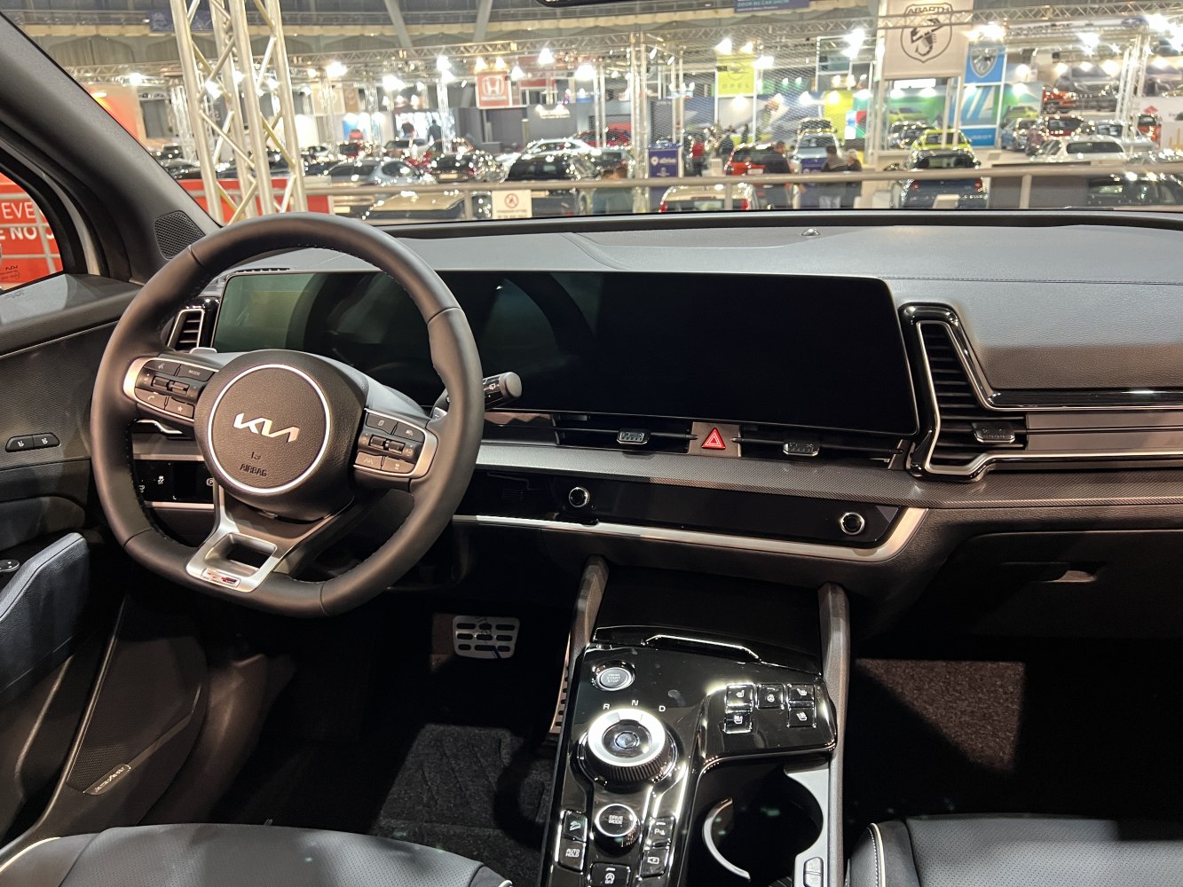Modern dashboard with digital displays and multifunction steering wheel