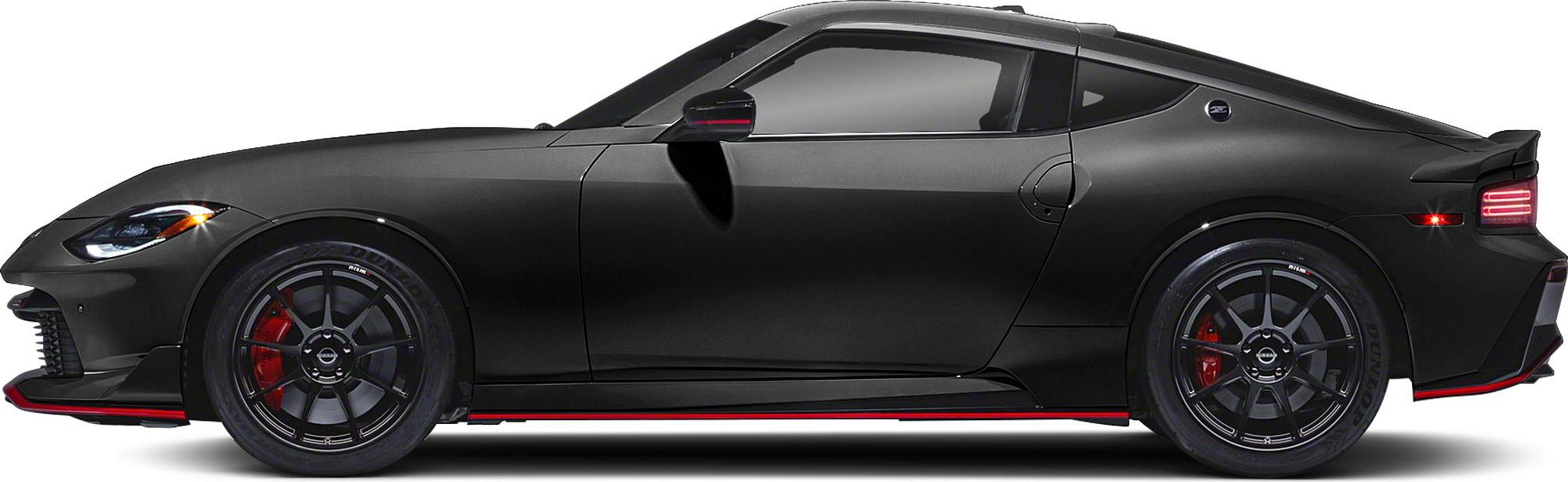 Side profile of sports coupe with black alloy wheels and red brake calipers