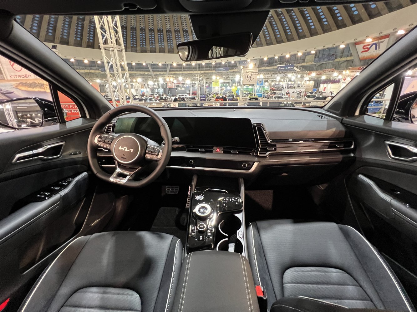 Digital dashboard and multifunction steering wheel inside a modern car interior