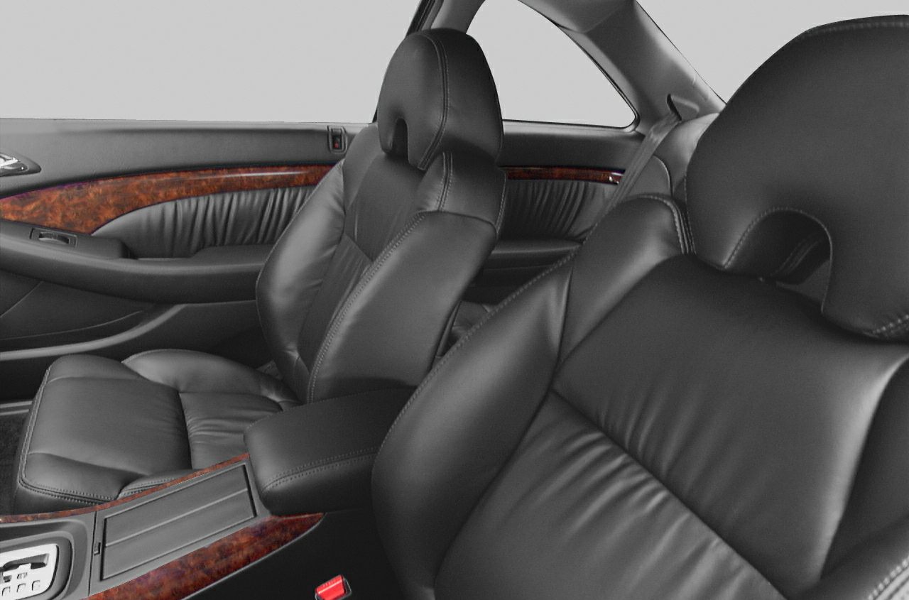 Black leather seats with wood trim interior