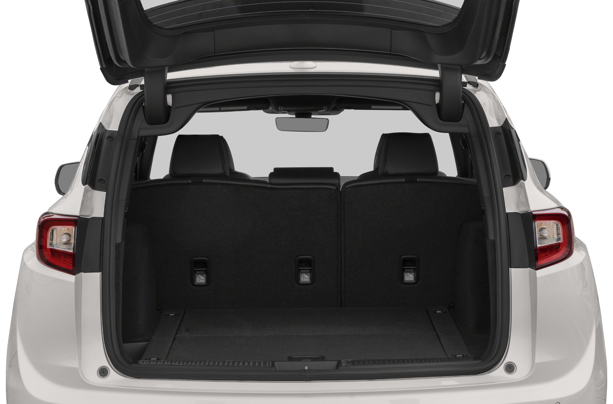 Spacious rear cargo compartment with upright rear seats and open hatch.