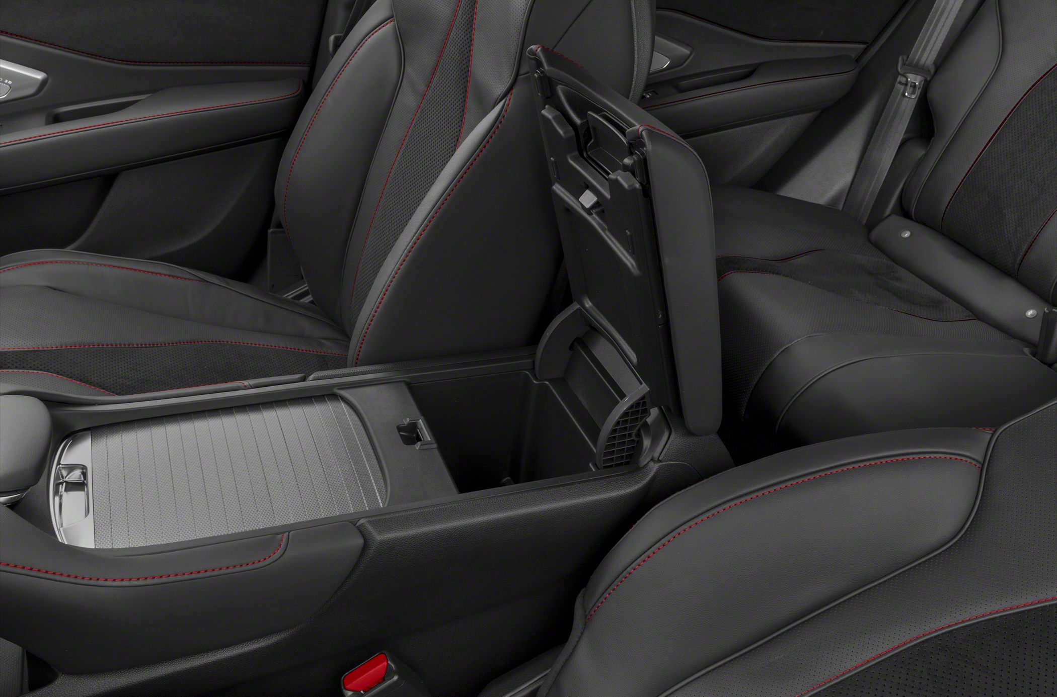Premium perforated leather seats with red stitching and open center console storage compartment