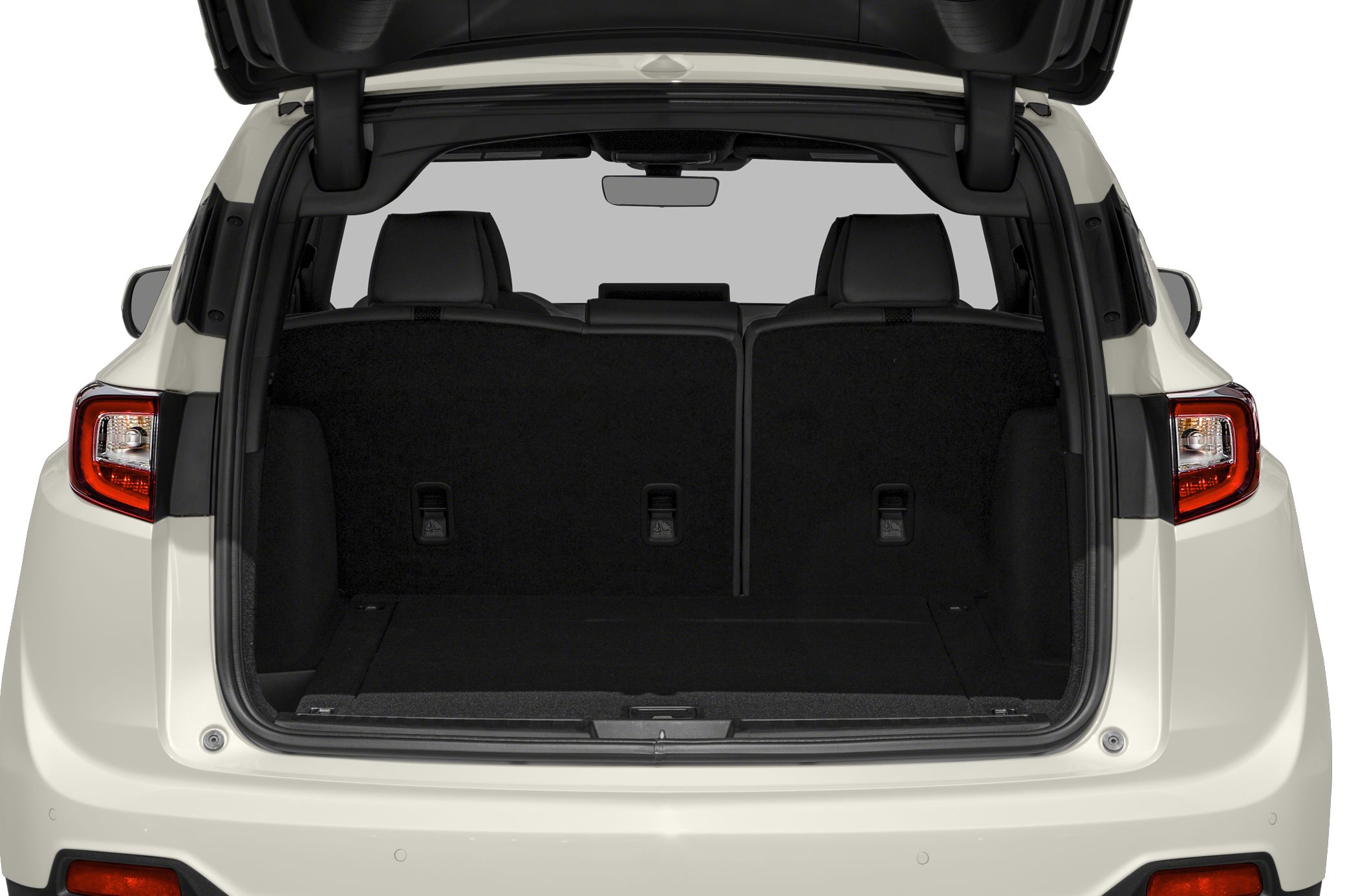 Rear cargo space of SUV with open hatch and upright rear seats