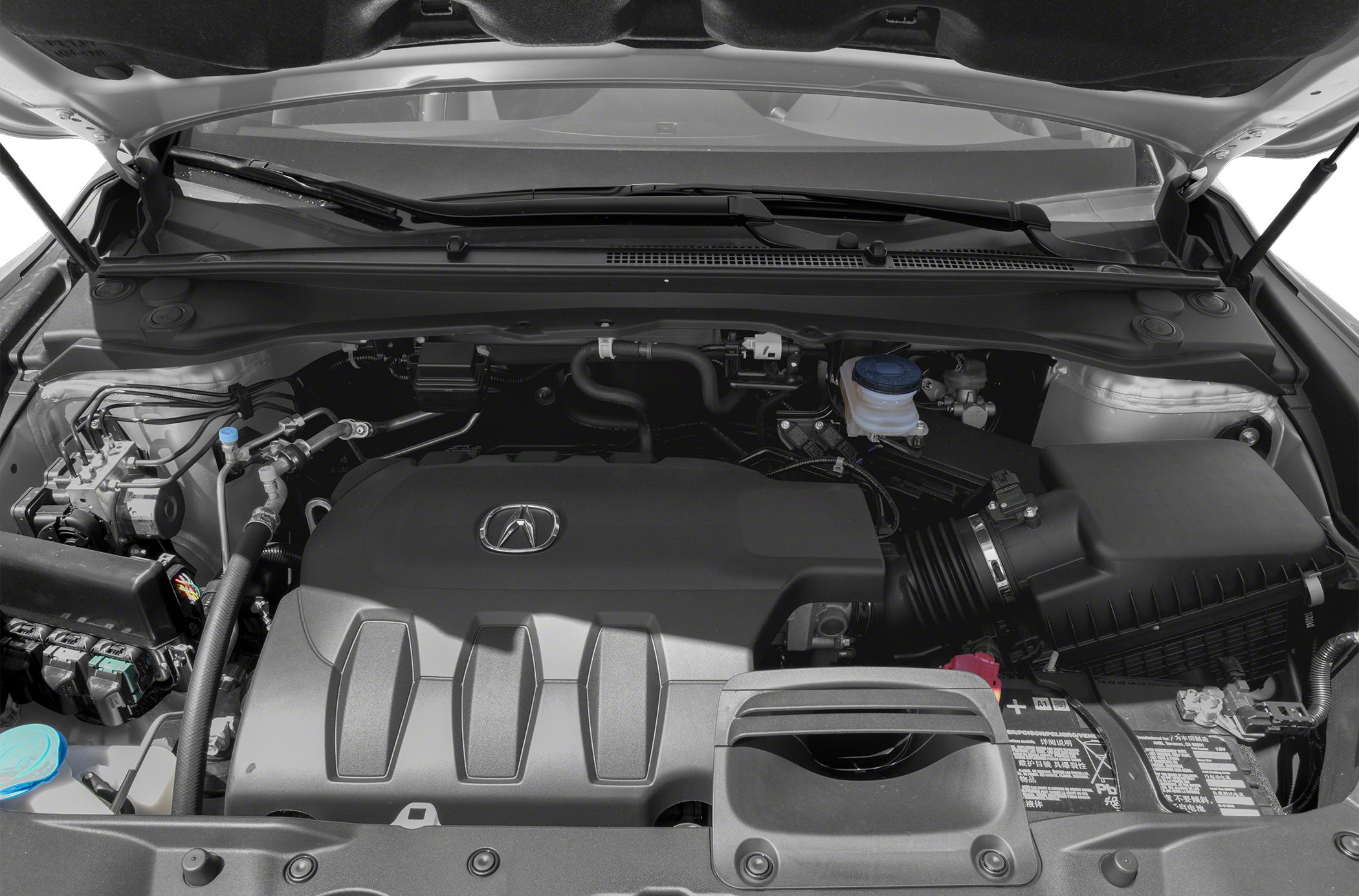Engine compartment with distinctive engine cover and visible components
