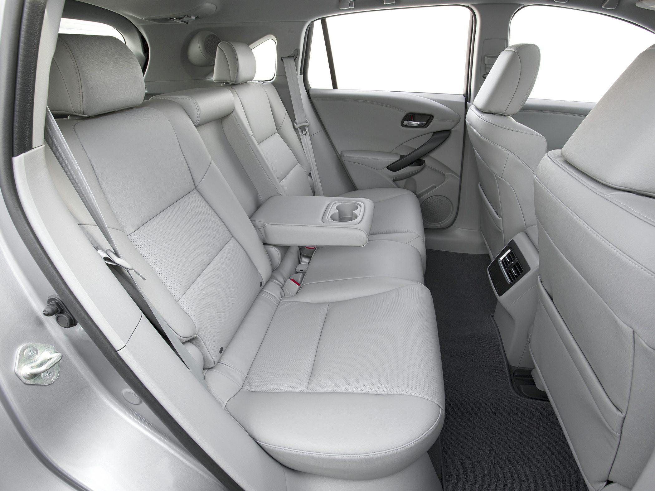 Spacious rear seats with leather upholstery and center armrest cup holder