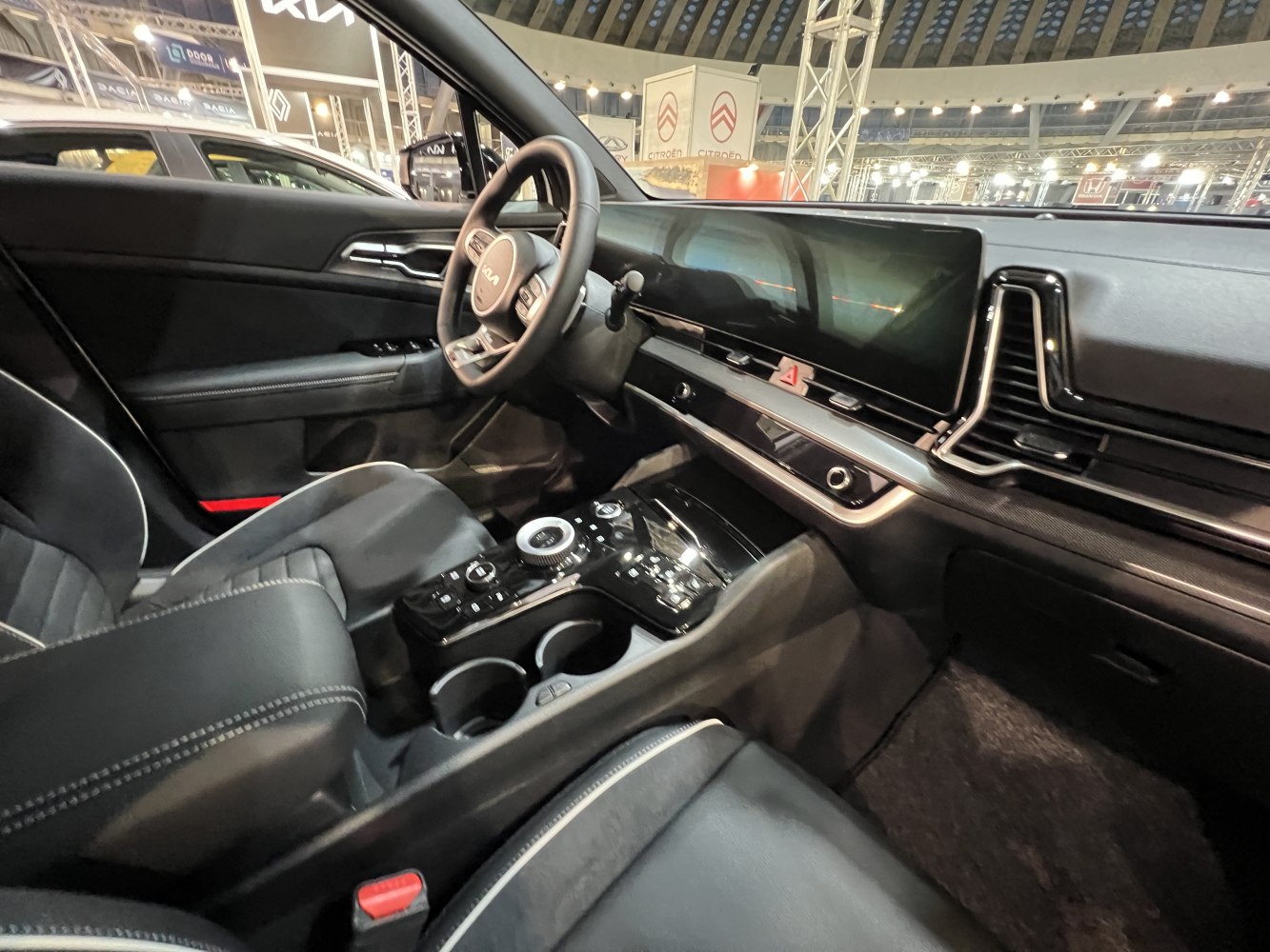 Modern SUV interior with digital dashboard and multifunction steering wheel