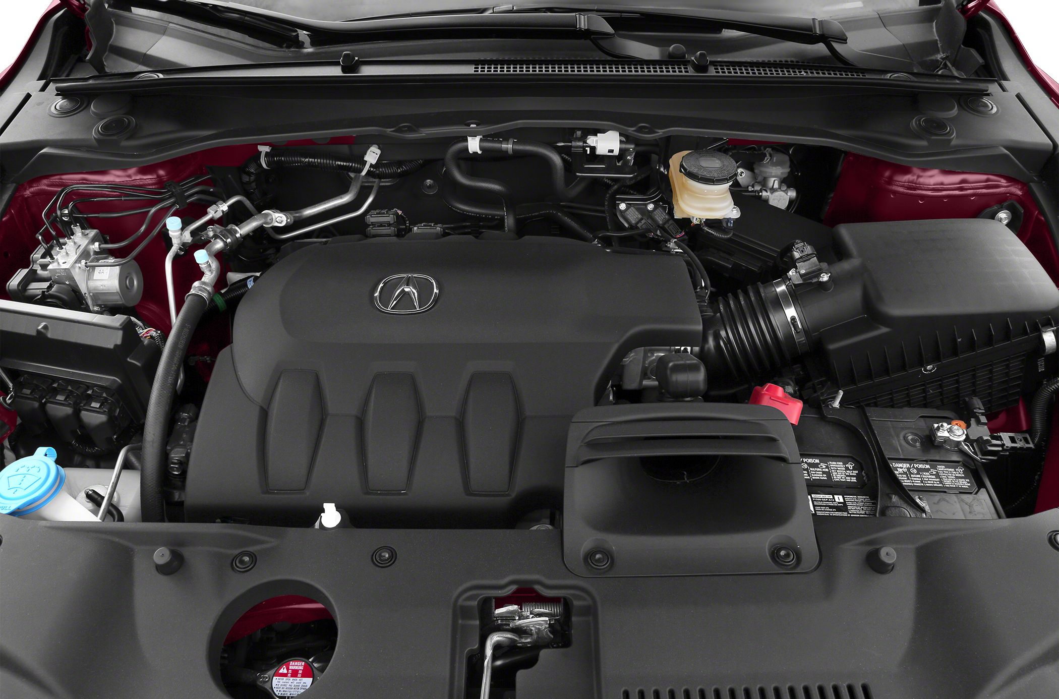 Engine bay with covered engine and visible components