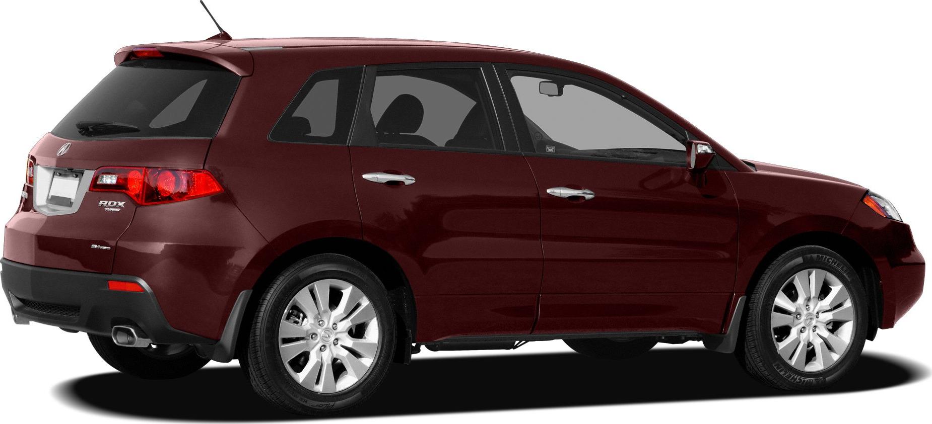 Rear side profile showing alloy wheels, tinted windows, rear spoiler, and taillights.