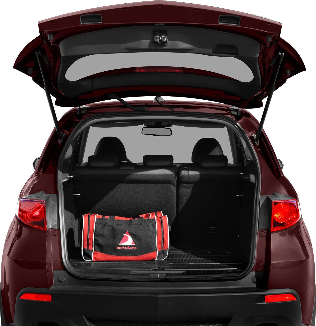 Open rear cargo space with tailgate lifted on compact SUV