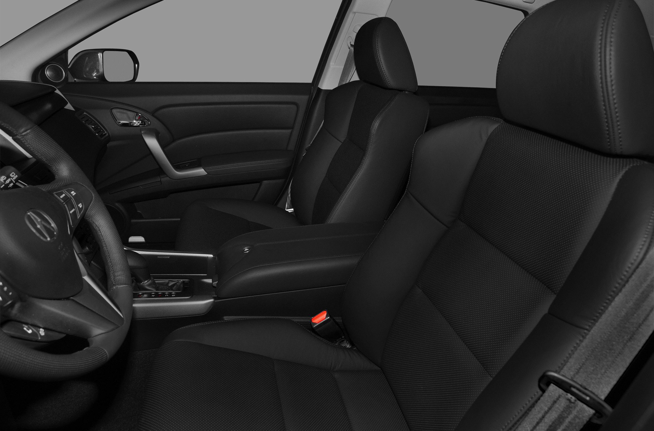 Front seats, steering wheel, and center console in black upholstery