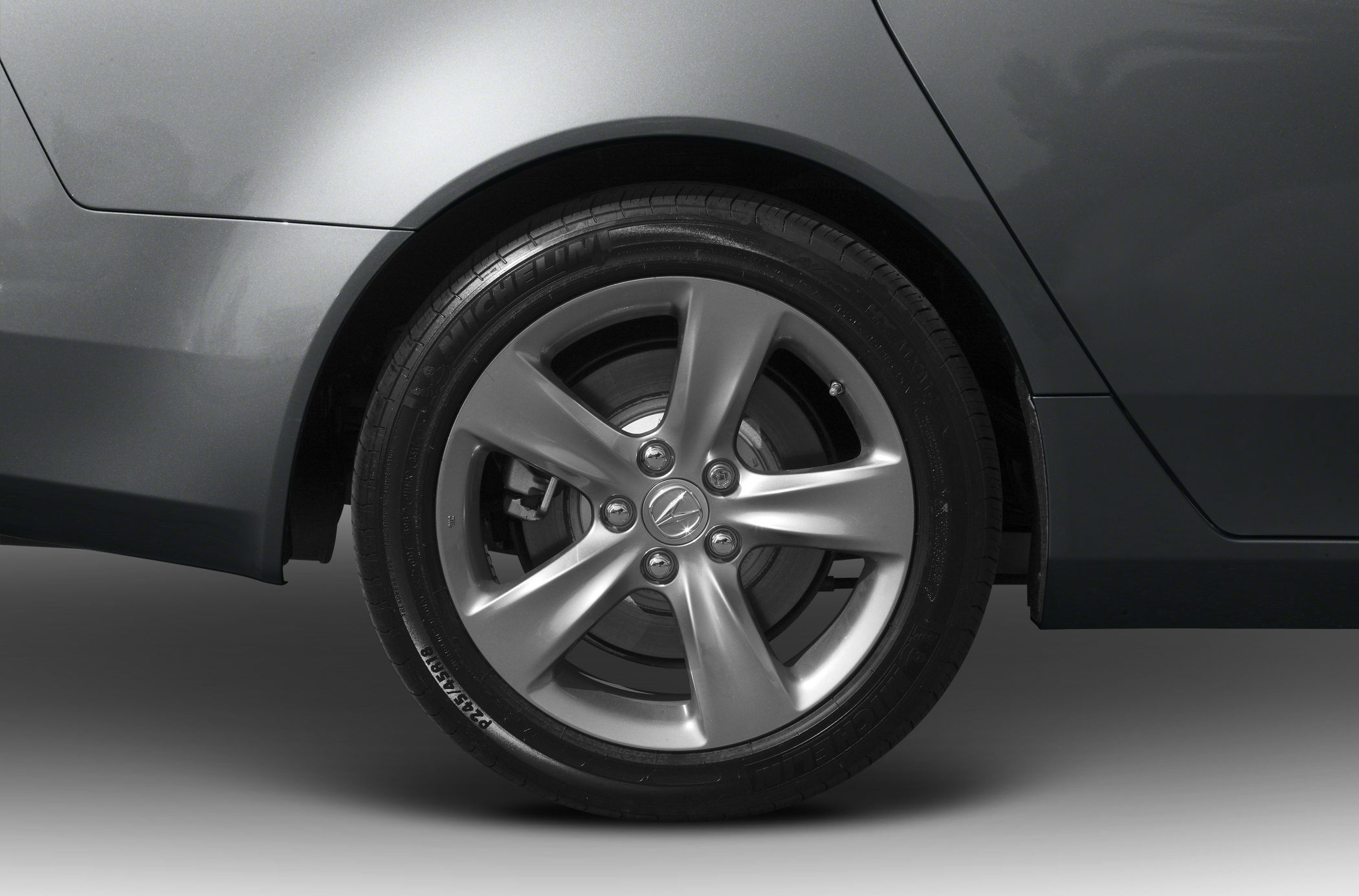Five-spoke alloy wheel with Michelin tire and brake disc