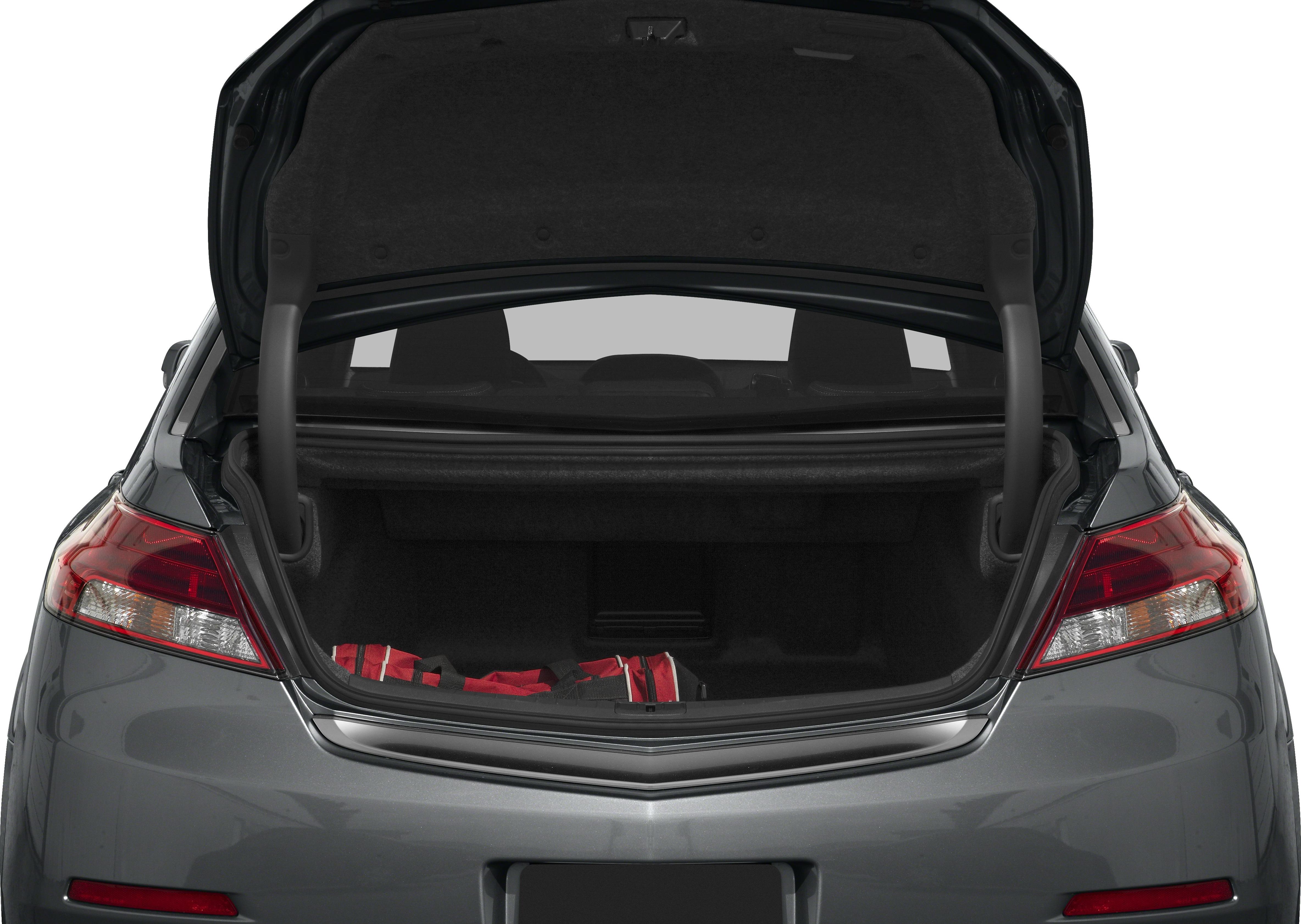 Open sedan trunk with visible red bag inside