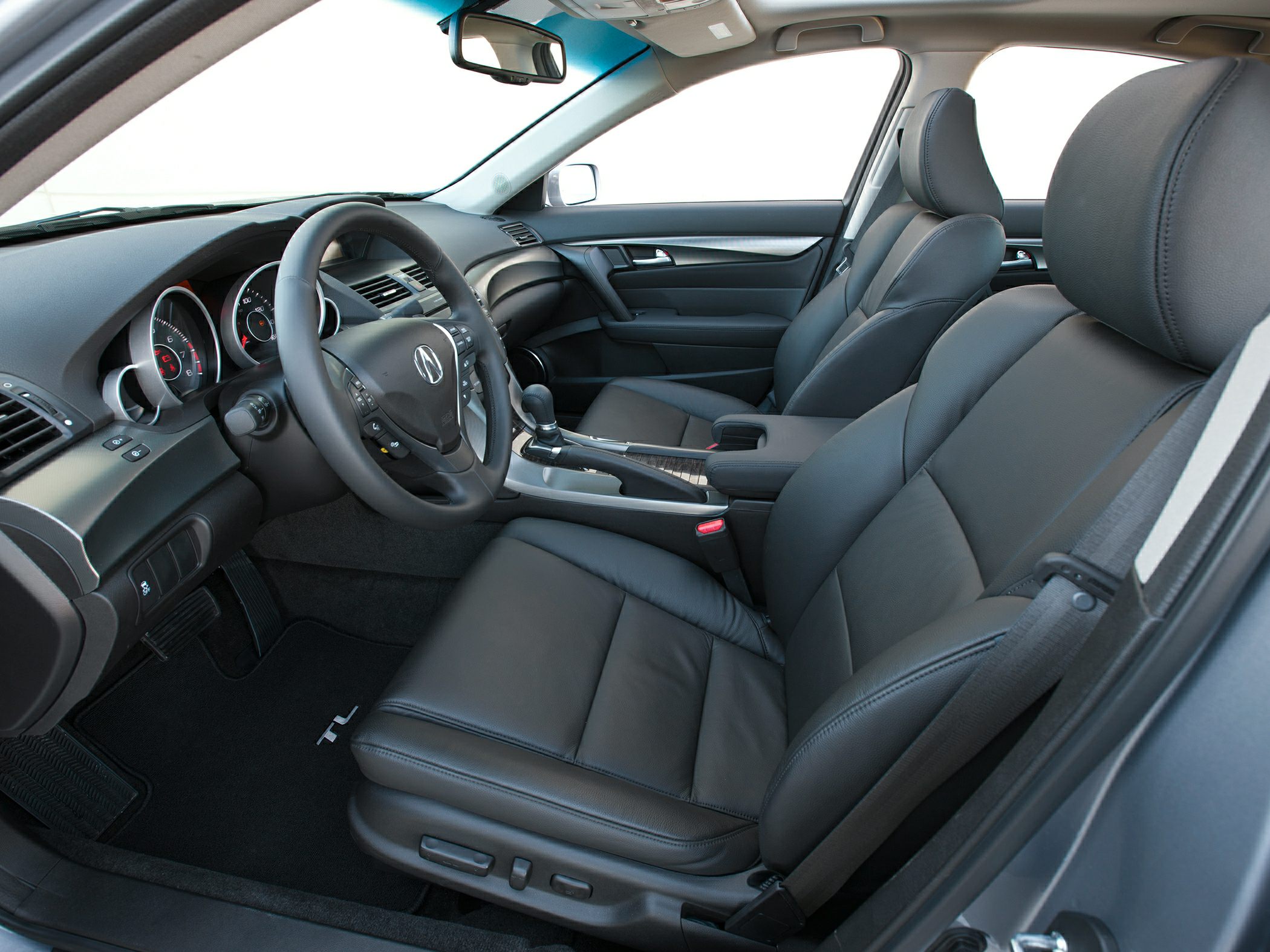 Black leather seats with multifunction steering wheel and modern dashboard layout