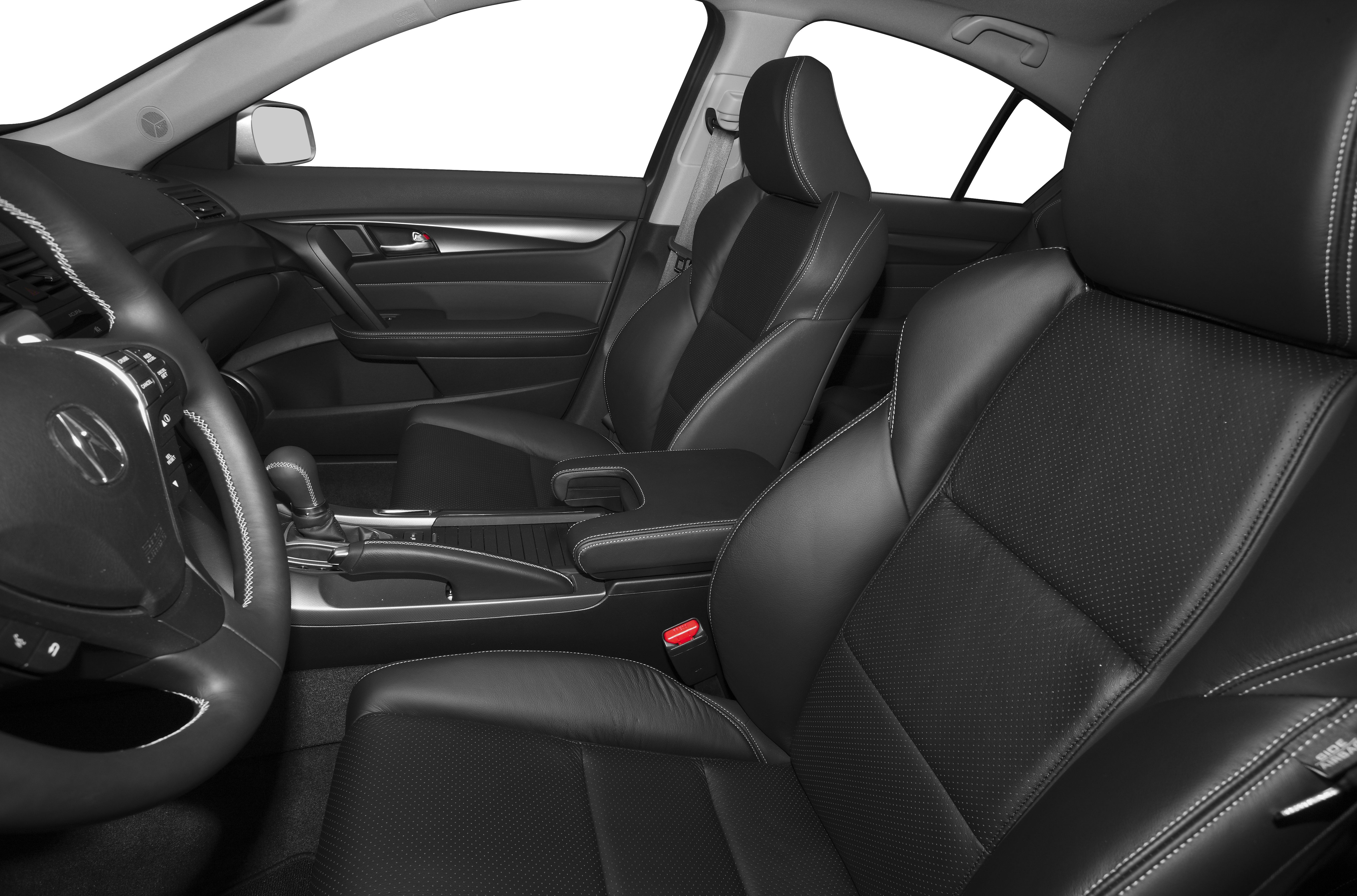 Leather seats and ergonomic dashboard with center console and steering wheel controls