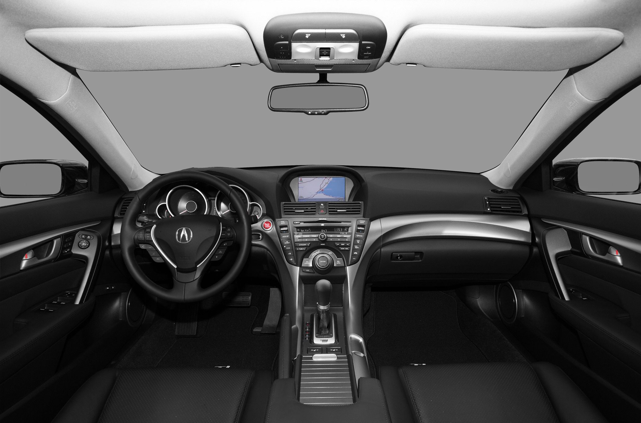 Dashboard and center console with navigation screen and steering wheel controls