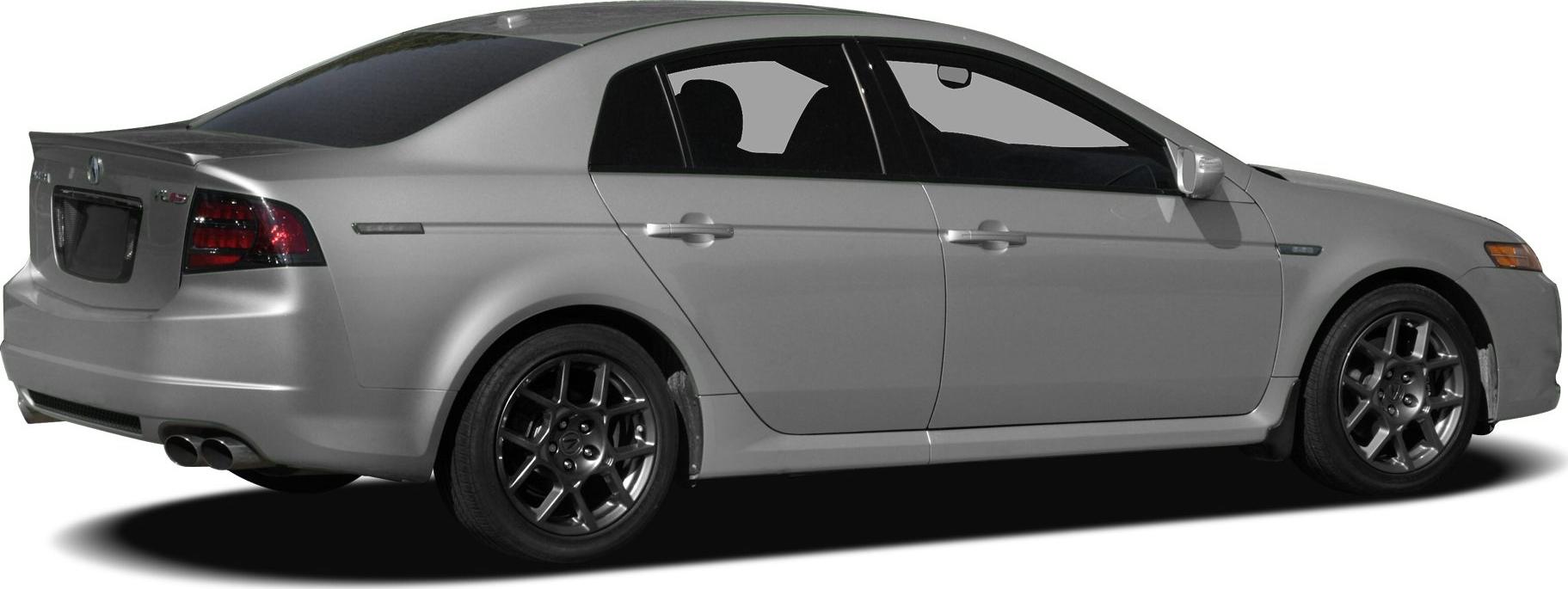 Side rear view of a sedan with alloy wheels, rear spoiler, and dual exhausts