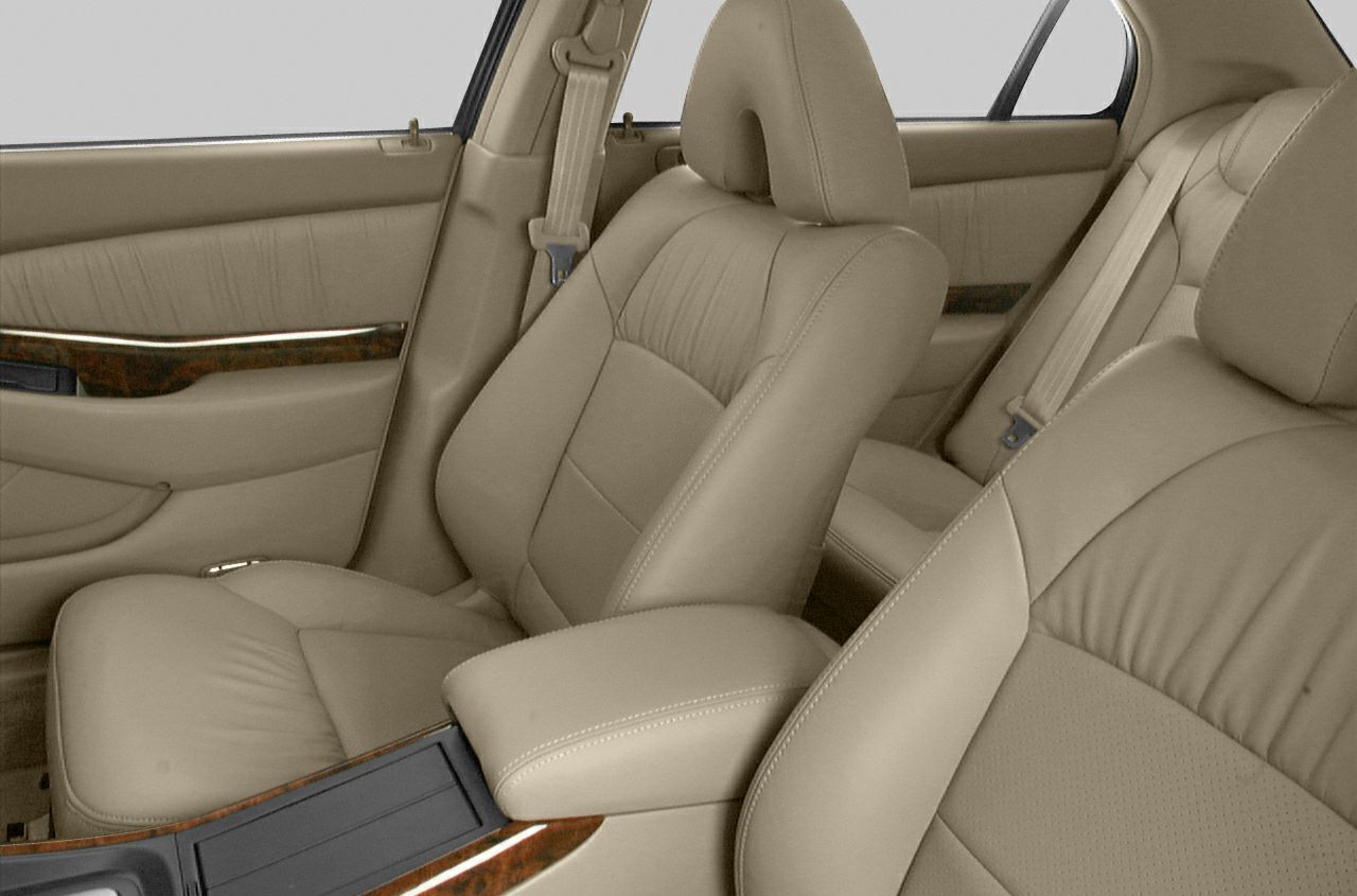 Beige leather seats with wood trim door panel