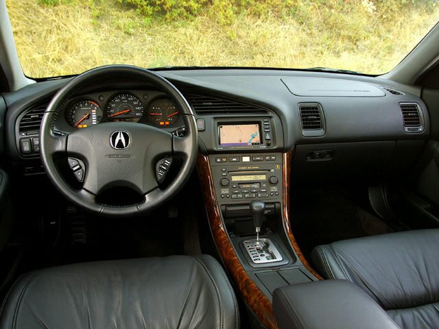 Dashboard, steering wheel, and center console with navigation system