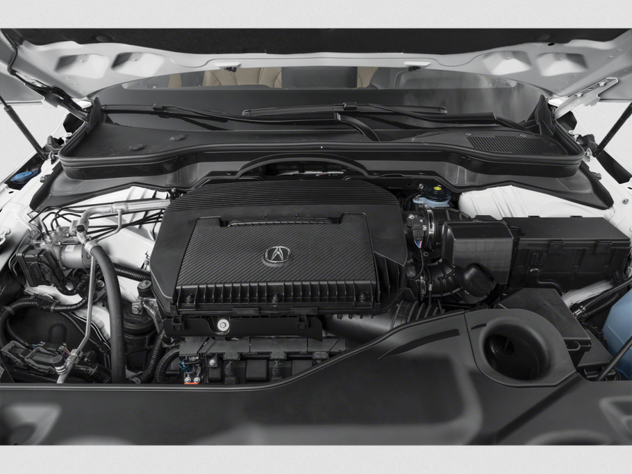 Modern engine bay with Acura emblem and engine cover