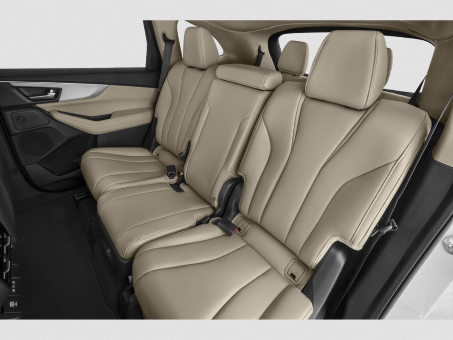 Beige leather rear seats with armrest and modern door panel trim