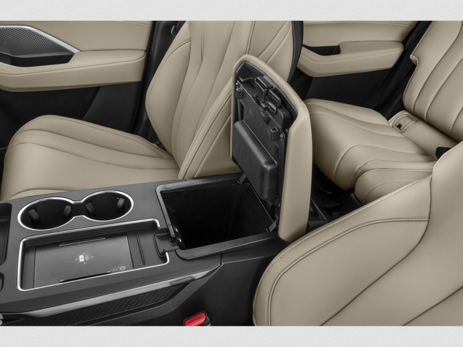 Beige leather seats and center console with wireless charging