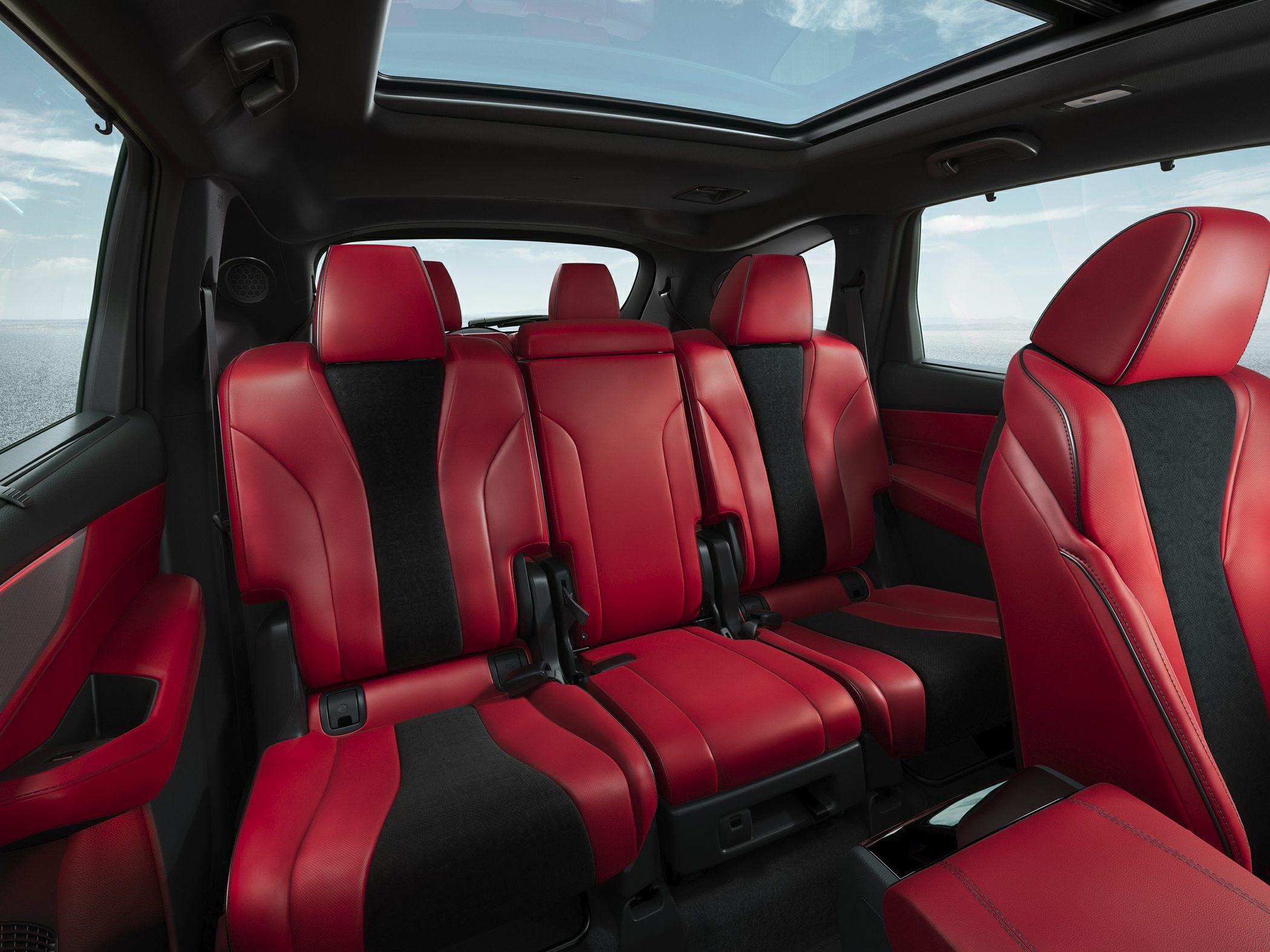 Red and black rear seats with panoramic sunroof interior