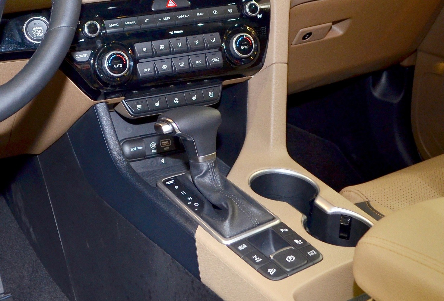 Center console with gear shift and climate control knobs