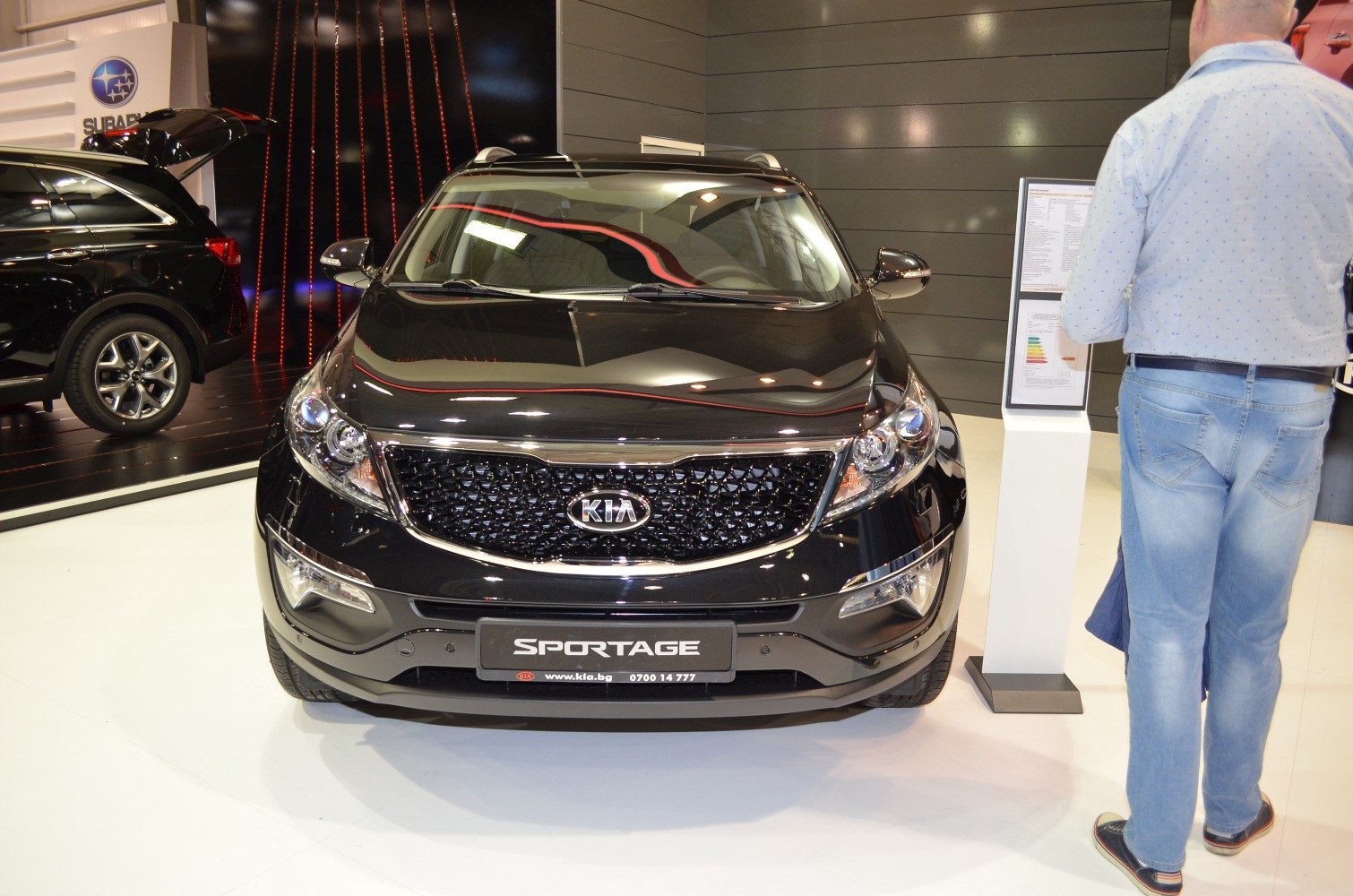 Front view of SUV with prominent grille and headlight design
