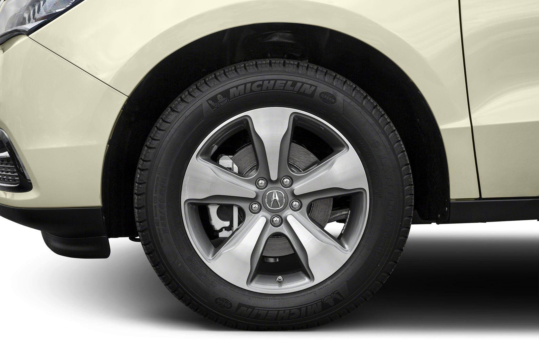 Alloy wheel and Michelin tire close-up on vehicle