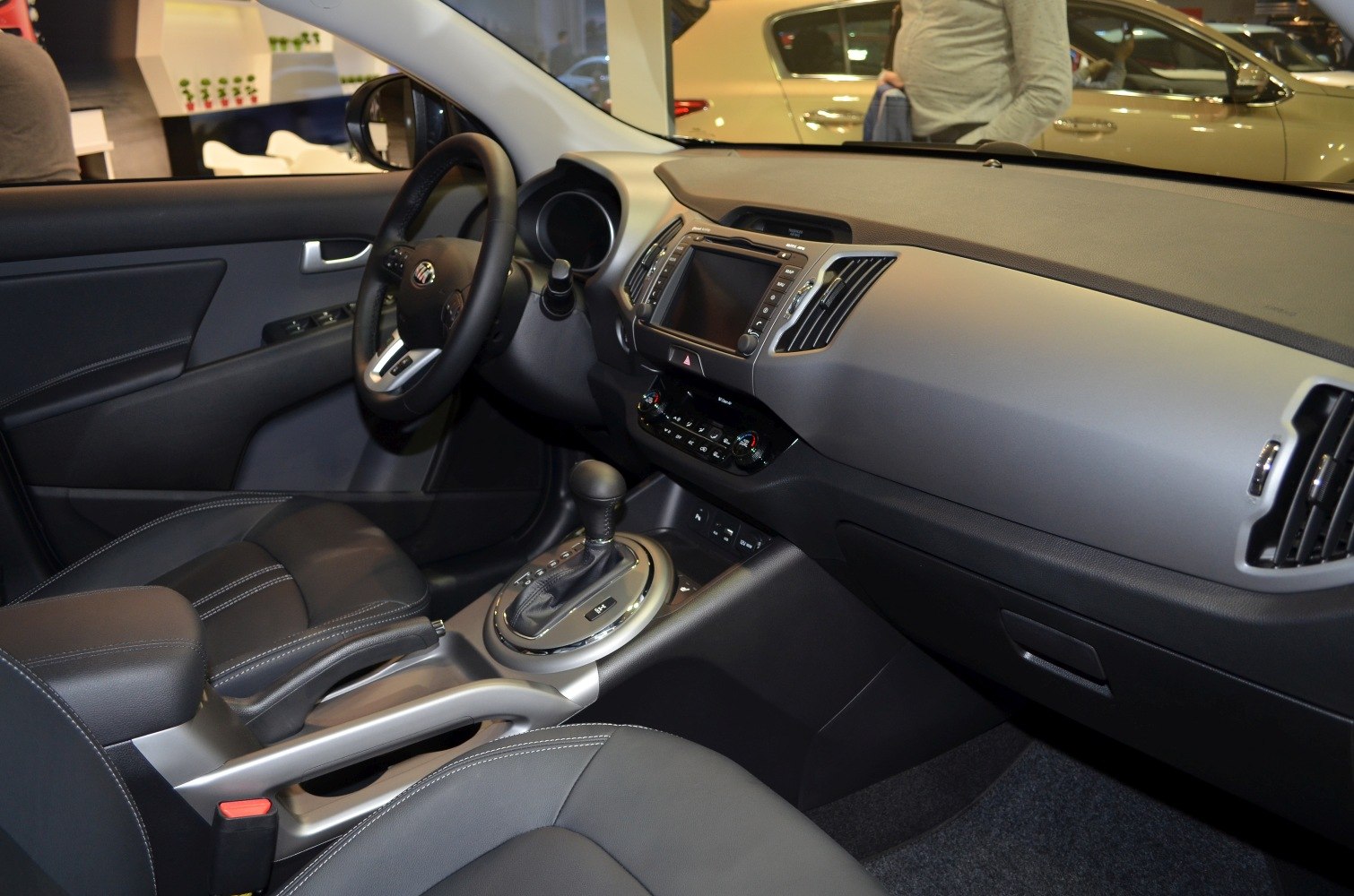 Modern car interior with touchscreen, ergonomic dashboard, and automatic gear shift