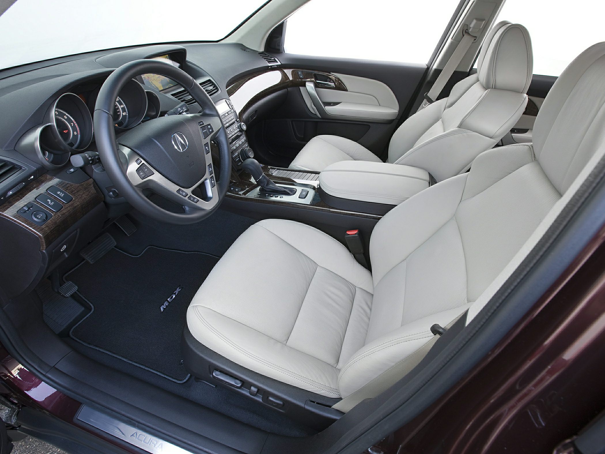 Luxury SUV interior with leather seats and wood trim